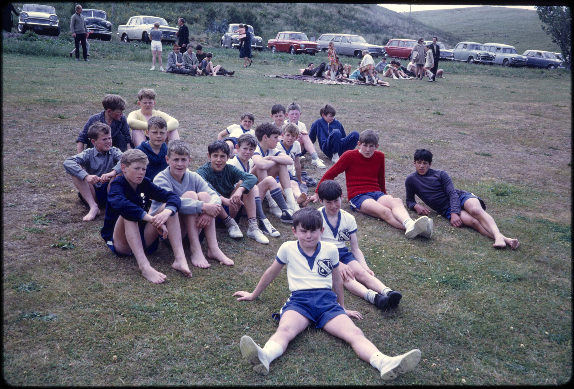 Boys sitting on grass