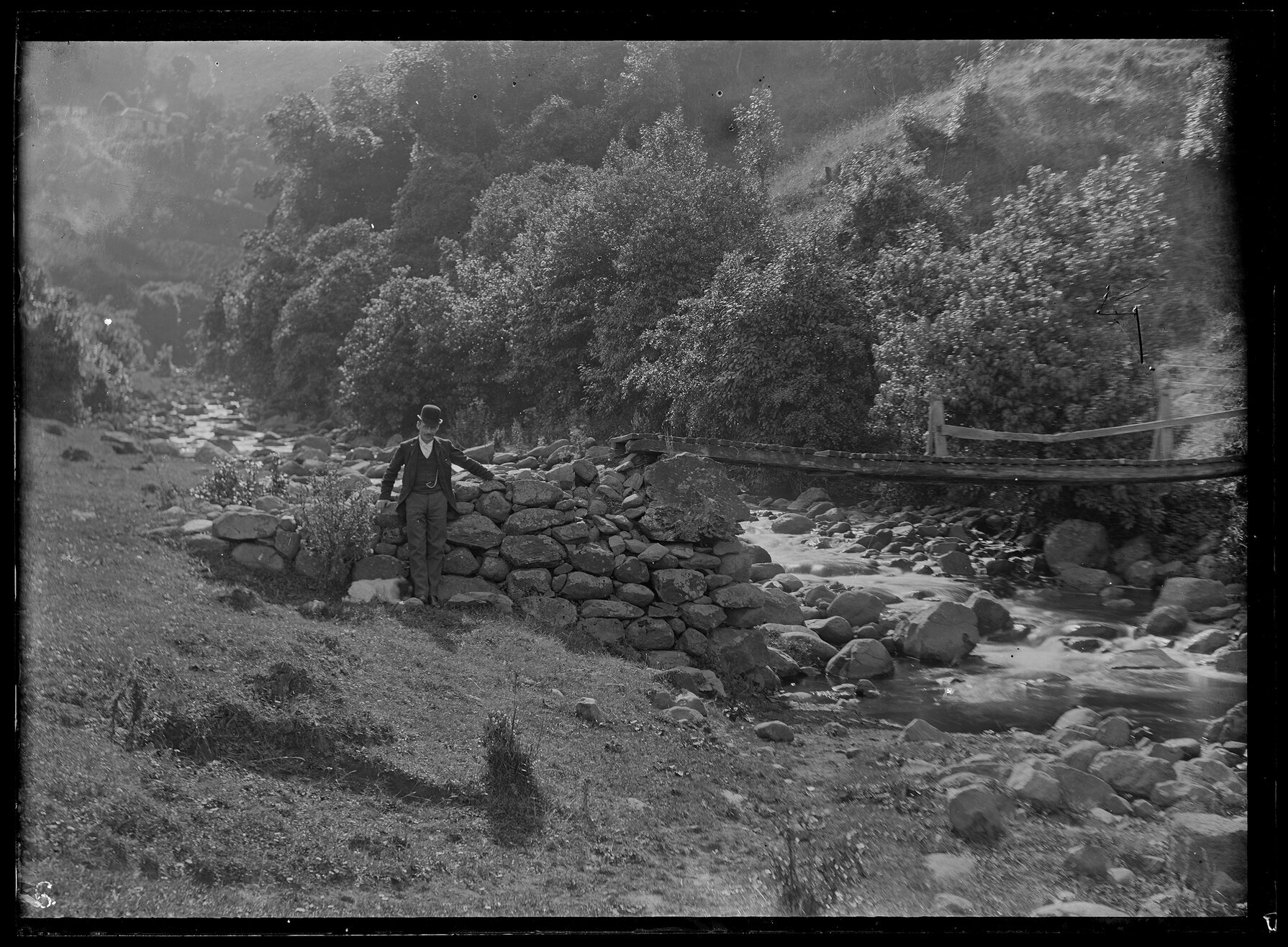 Man on riverbank