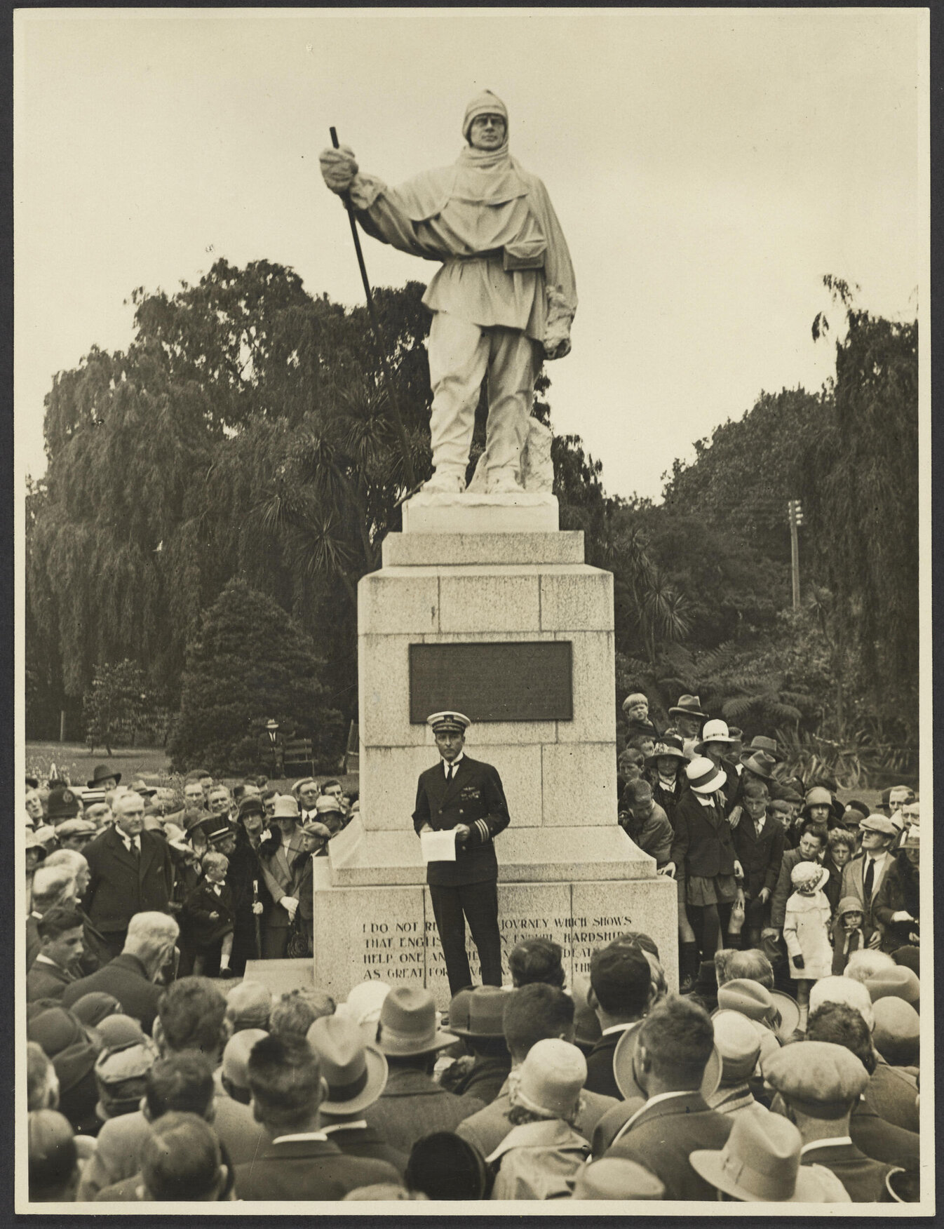 Robert Falcon Scott statue and gathered crowd