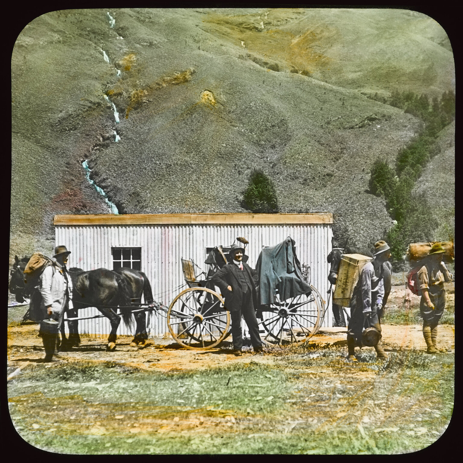 Group in front of hut, Matukituki Valley