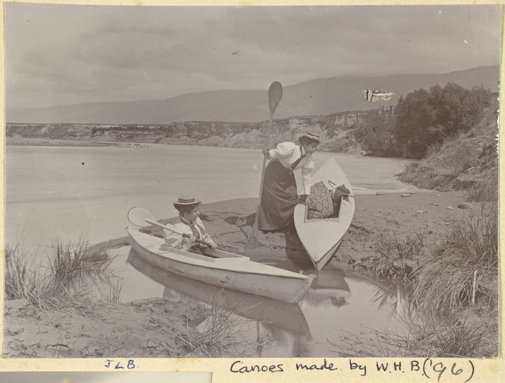 Two Buckland sisters in canoes