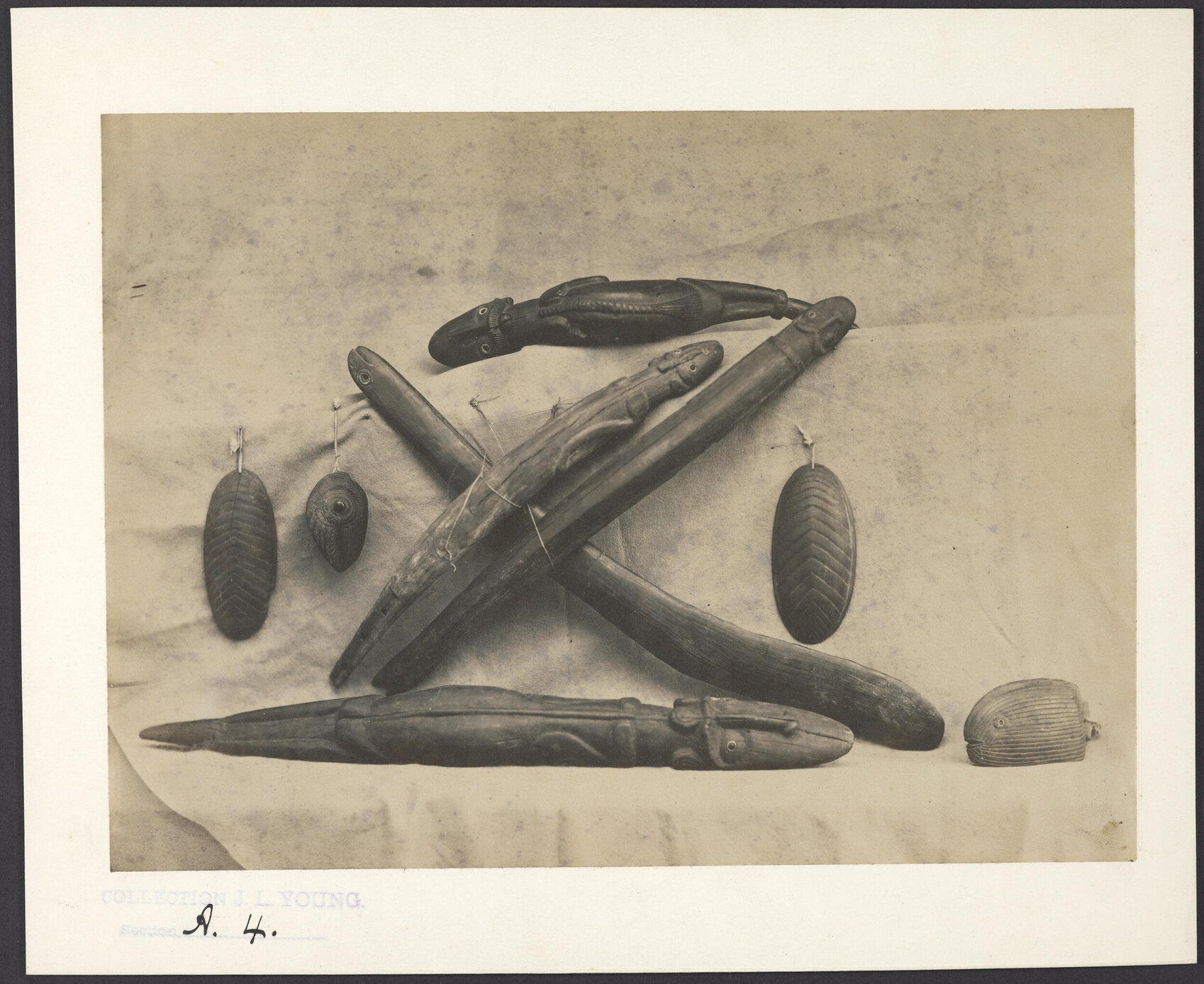 Marine and reptilian carvings