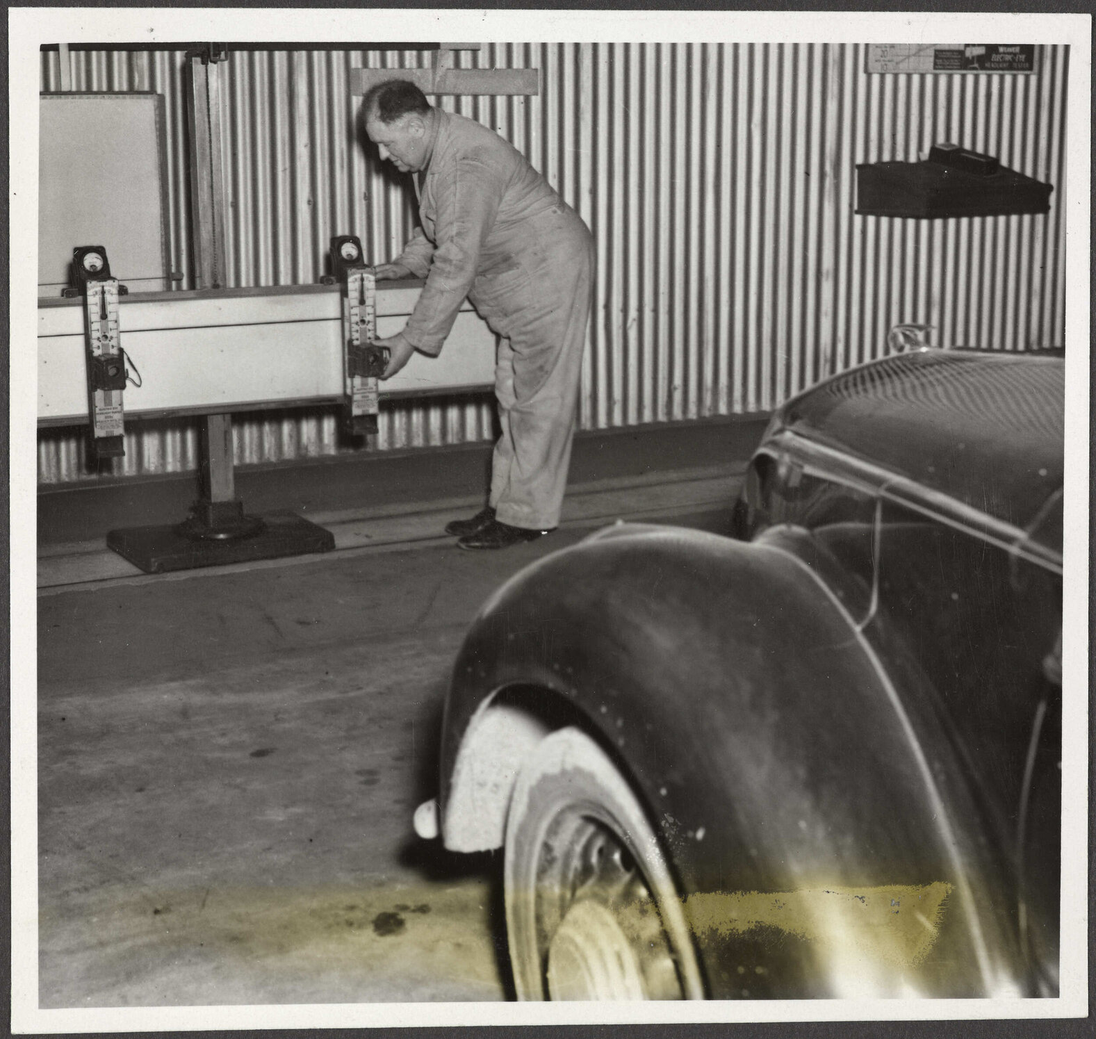 An attendant at the DCC Motor Vehicle Testing Station