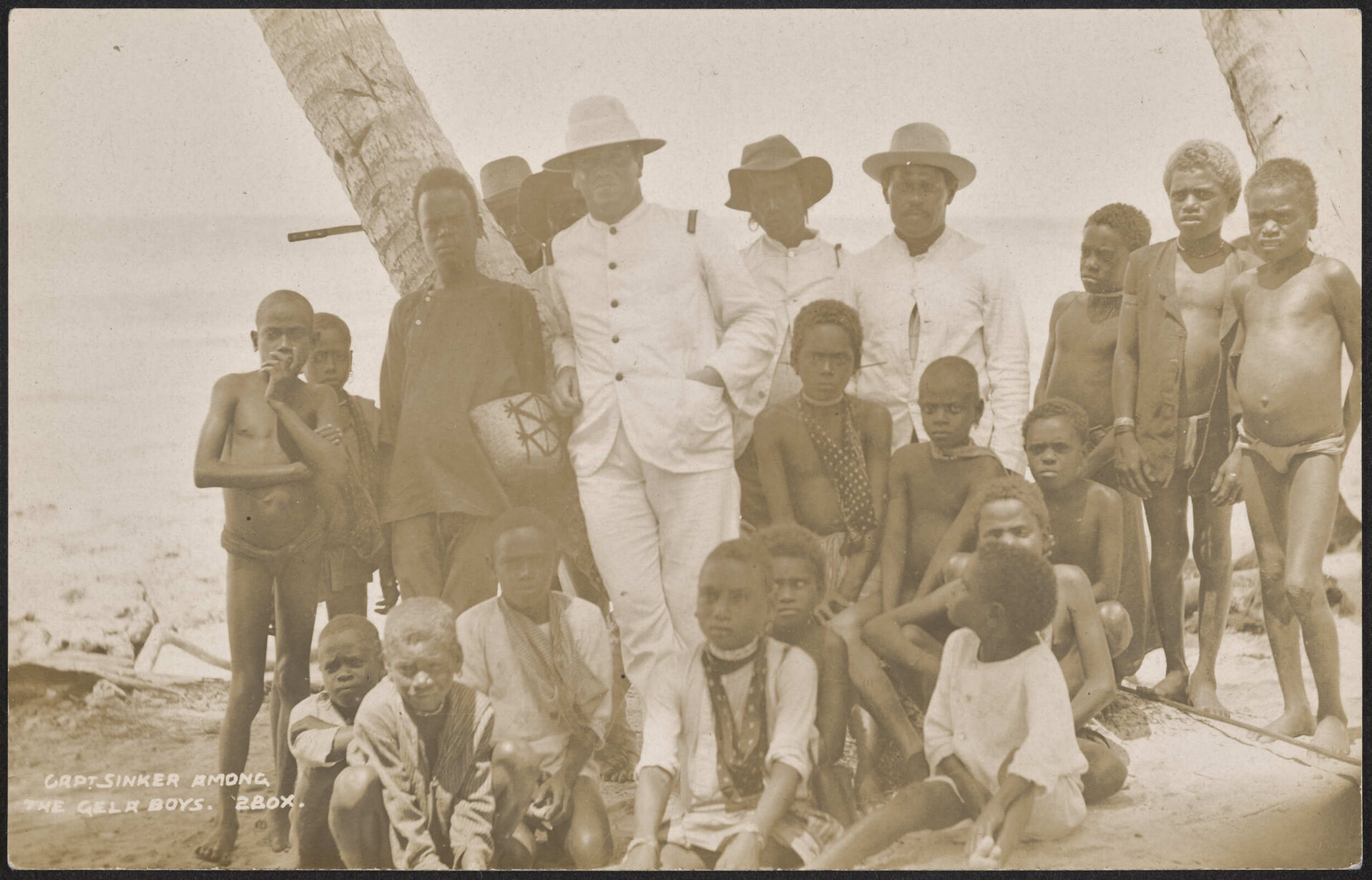 Capt Sinker among the Gela boys