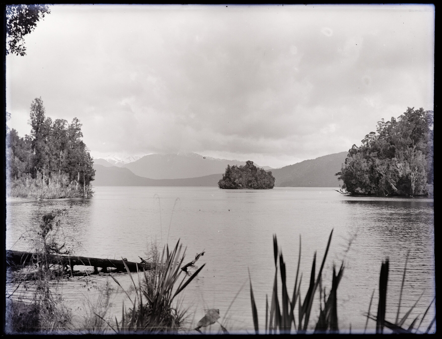 Unidentified body of water with small island, Westland