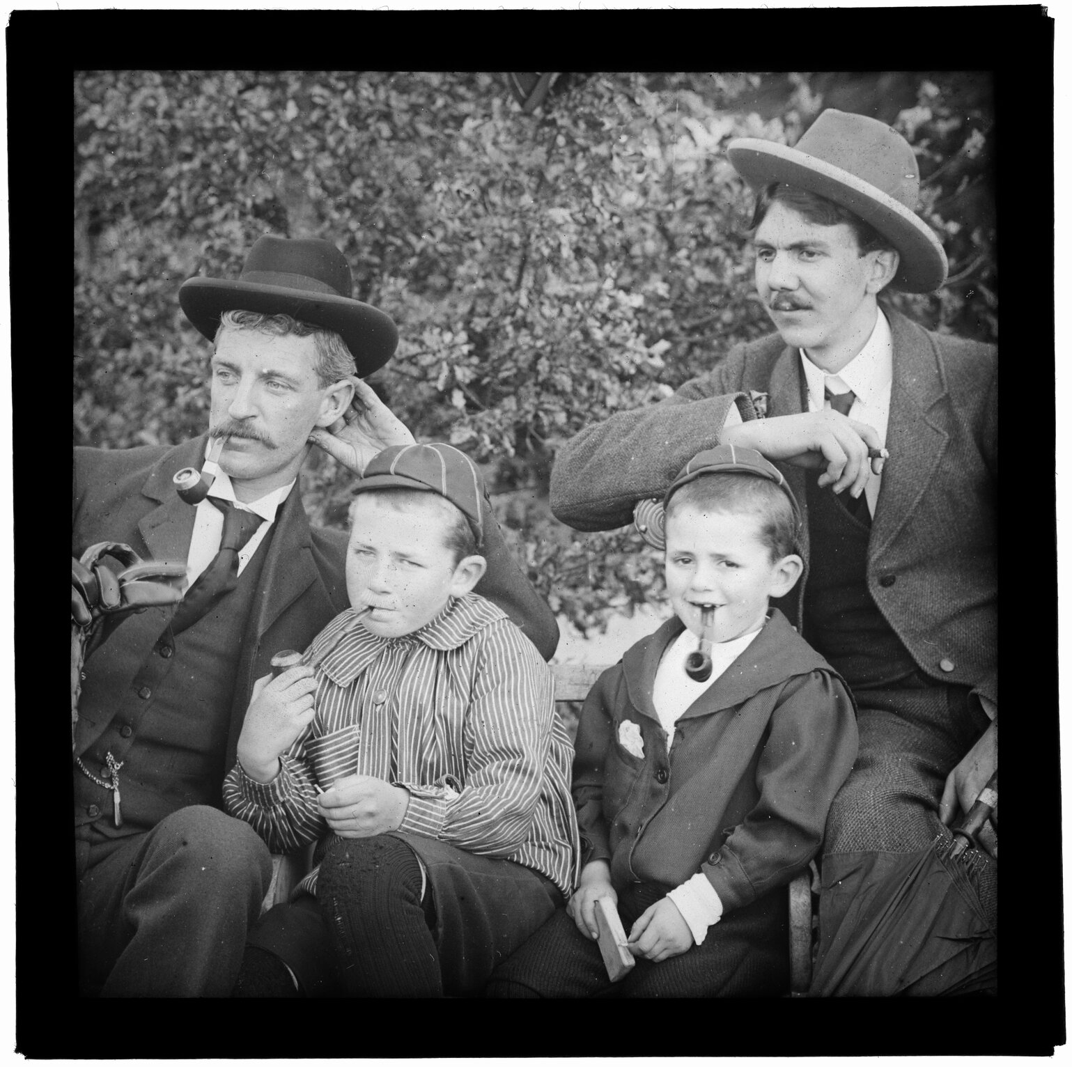 Men and boys with pipes