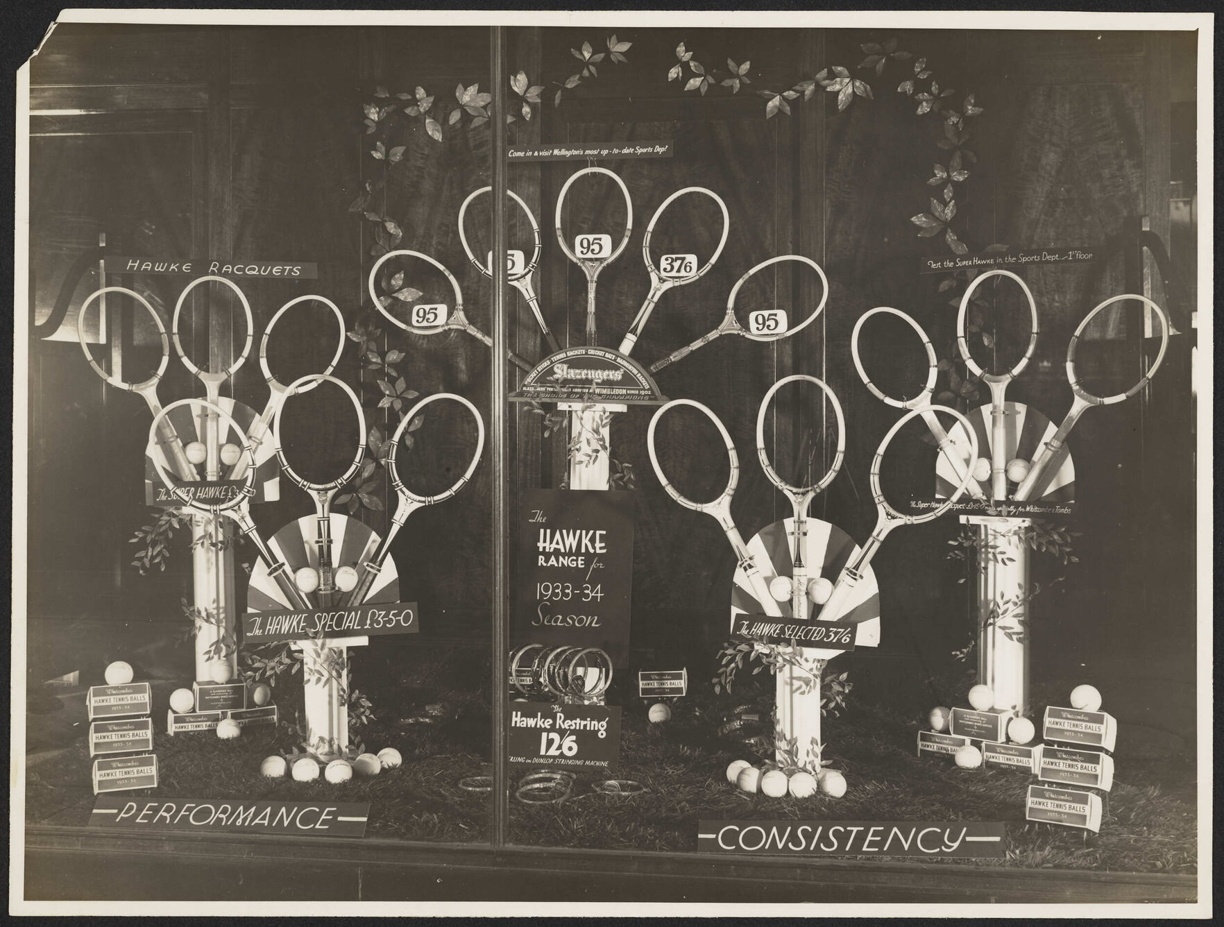 Hawke tennis racquets and balls window display