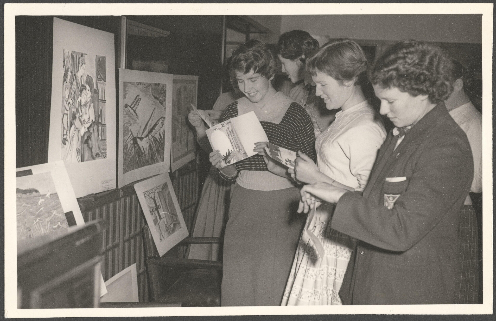 Training College students at art exhibition