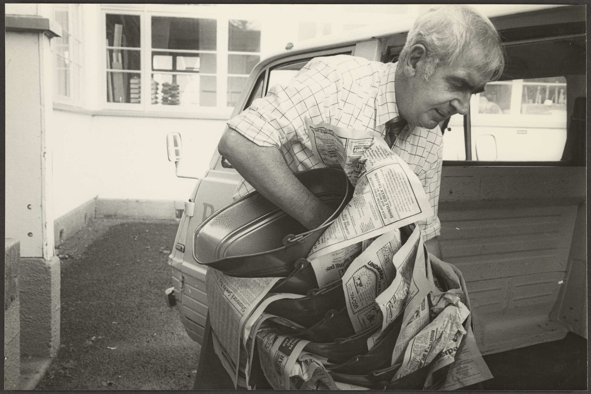 Loading van with metal buckets