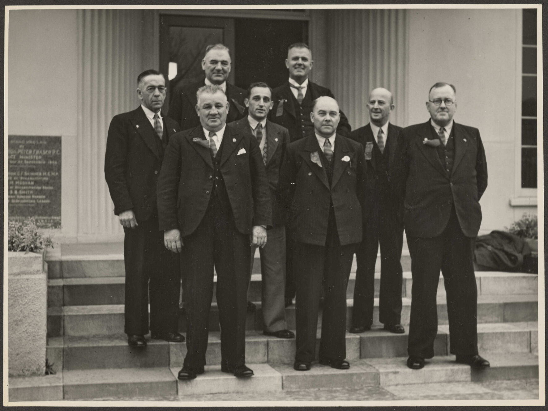 Group of men on the steps of the Disabled Servicemen's Vocational Training Centre