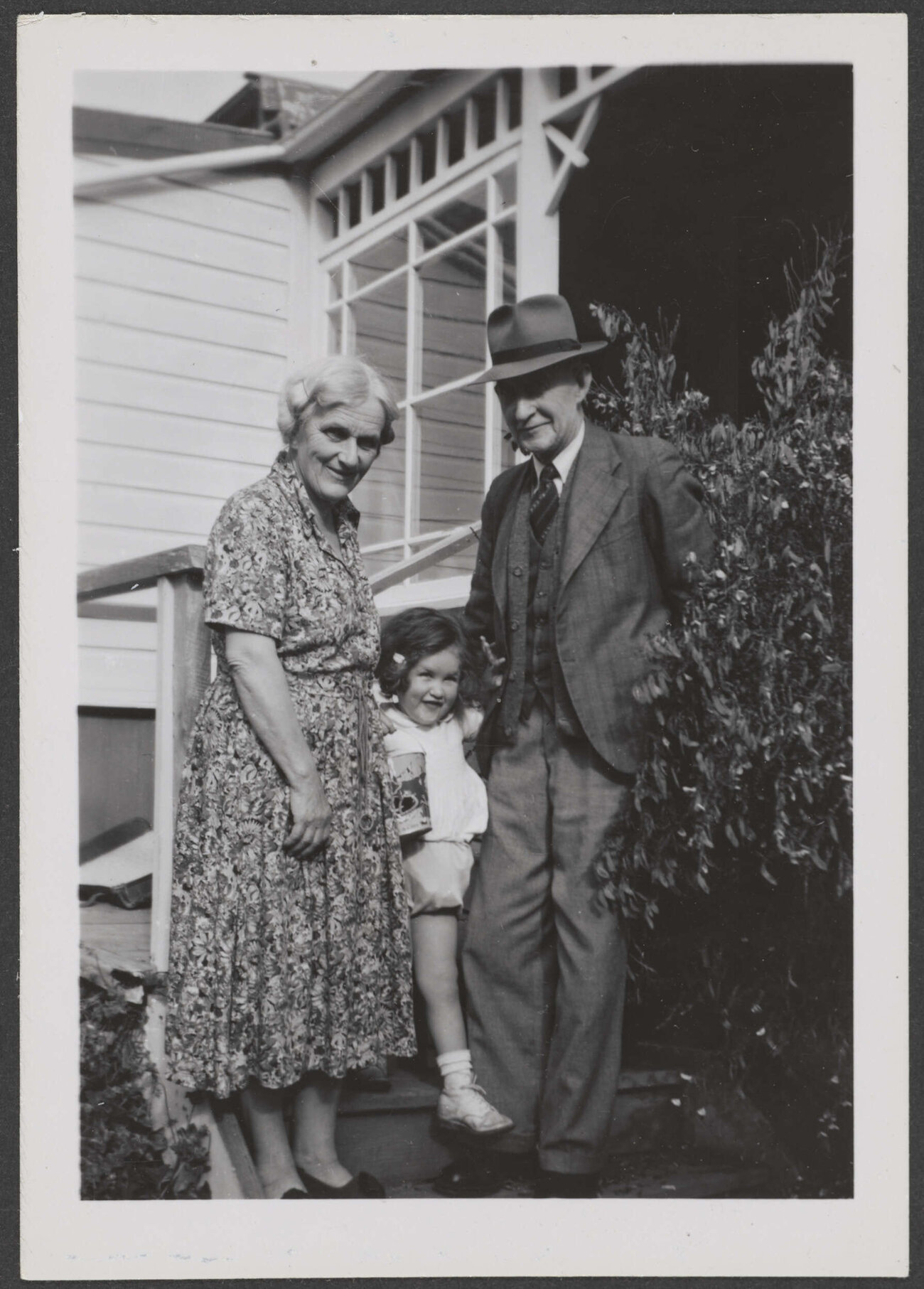 Millicent and Archibald Baxter with one of J.K. Baxter's children