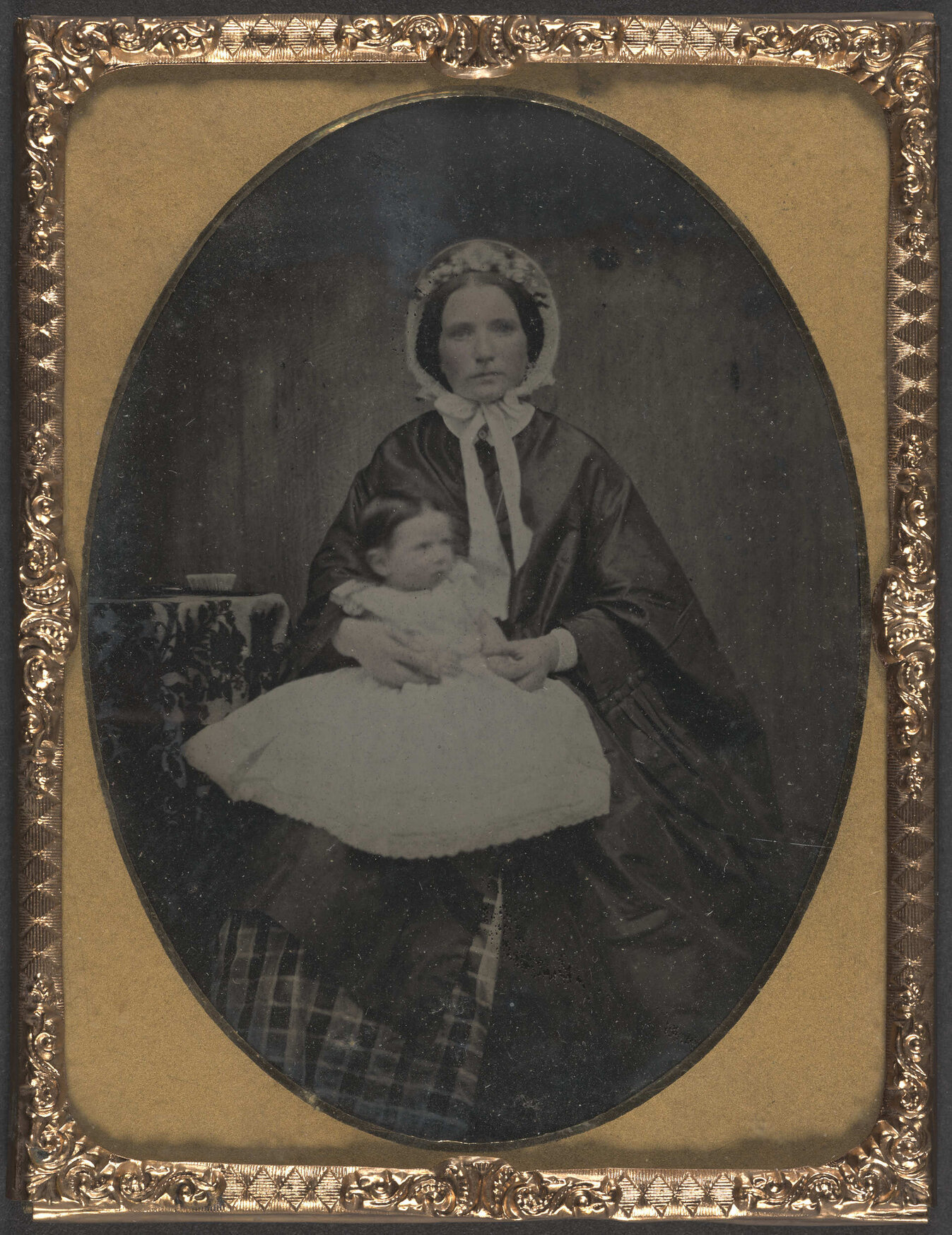 Unidentified woman and child