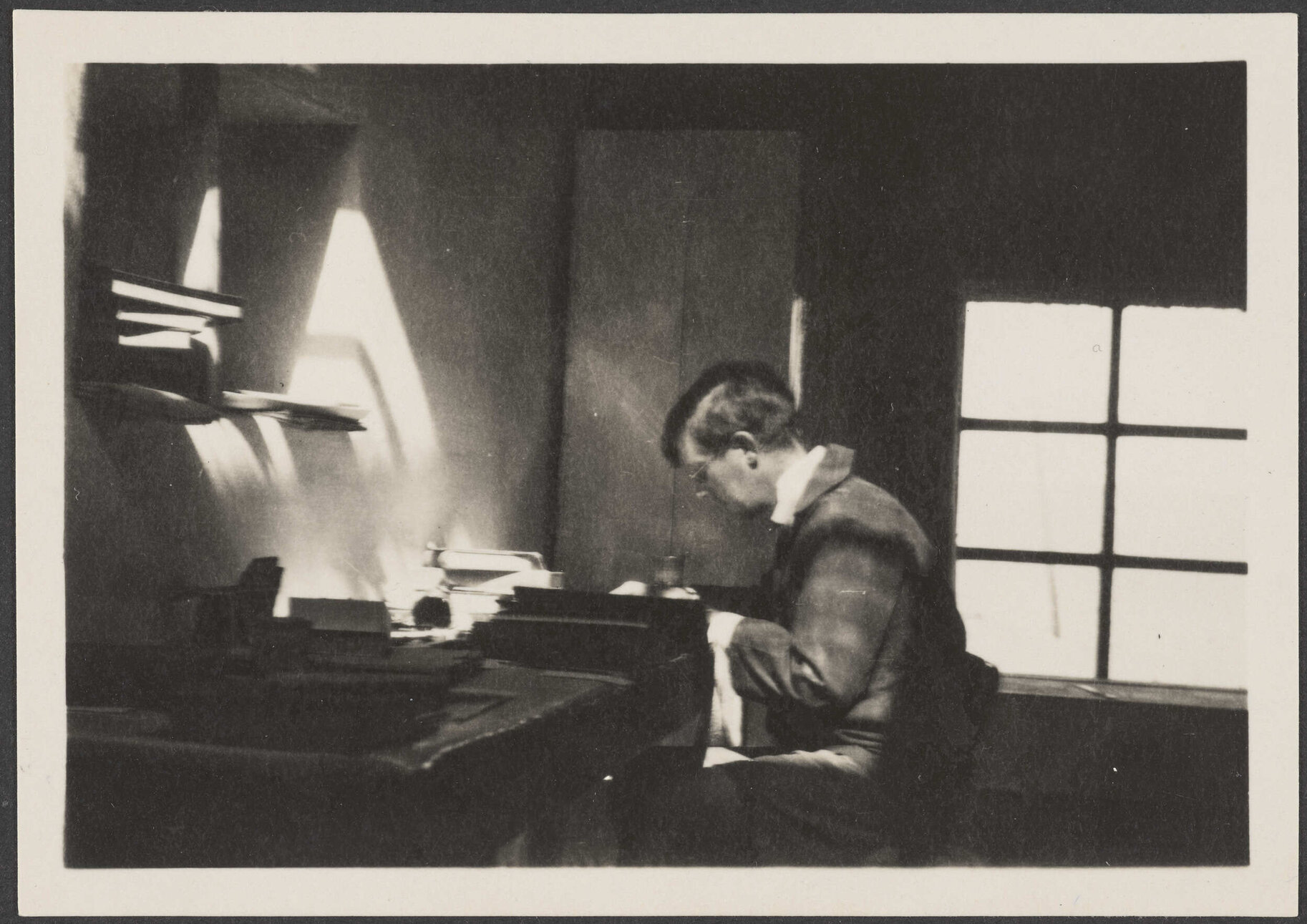 Man [C. Roberts?] at a desk