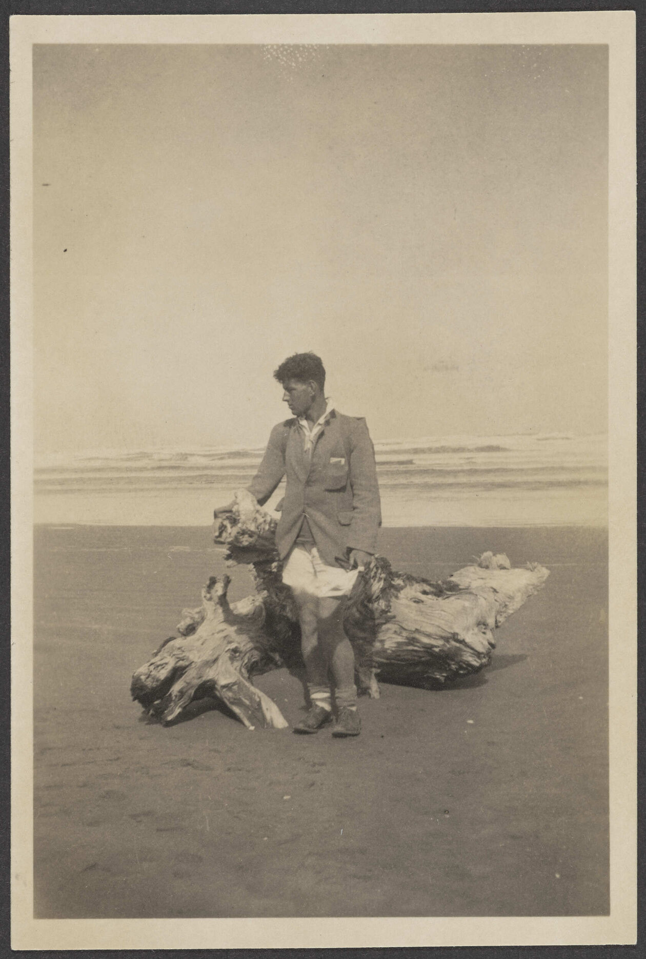 [James Bertram] standing on a beach