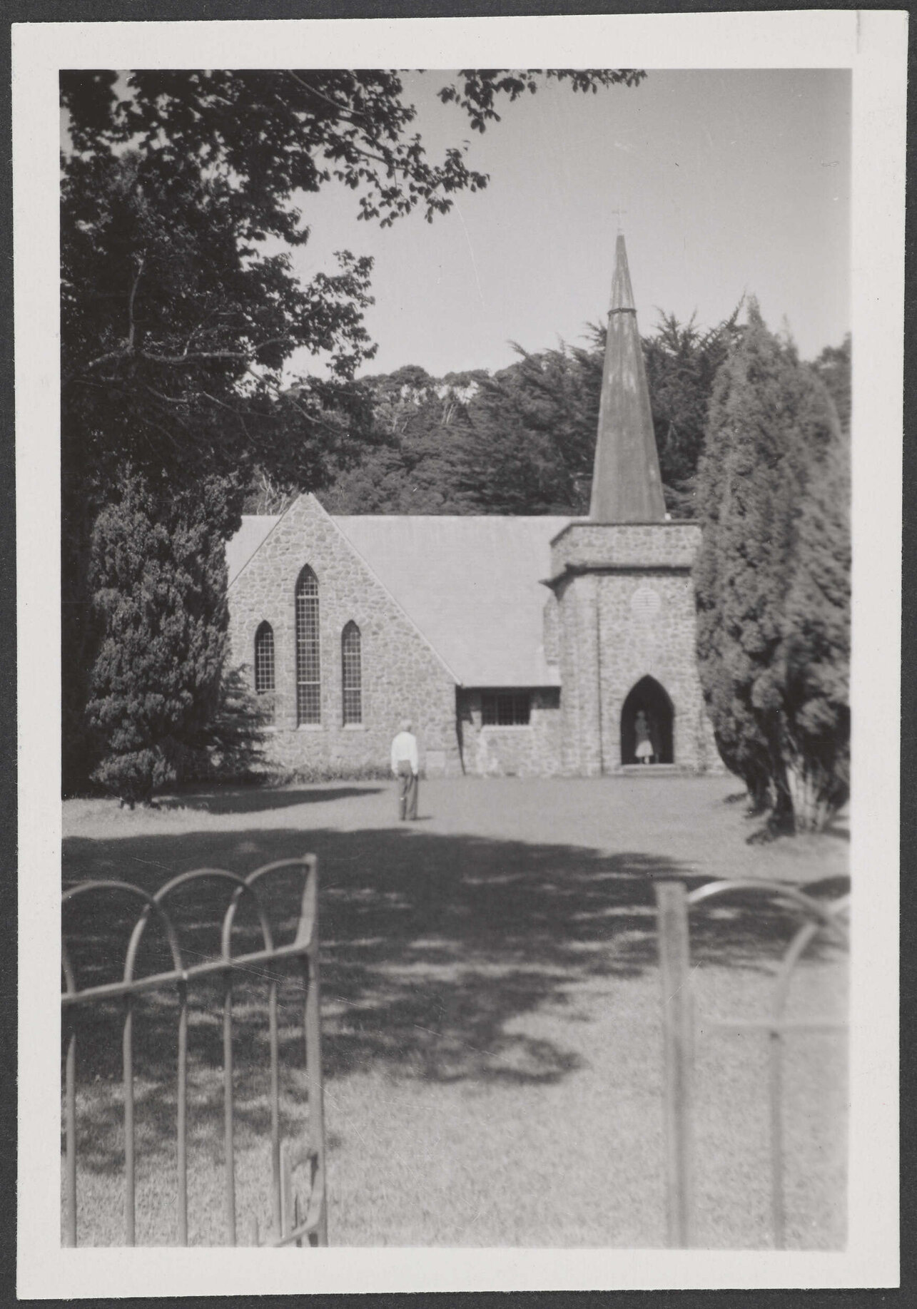 Man and woman outside St Paul's Anglican Church, Paihia