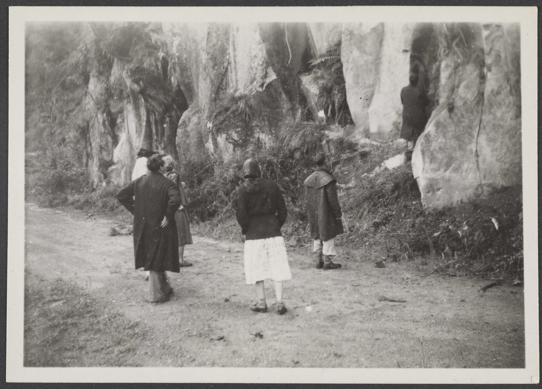 Group of people on a dirt road