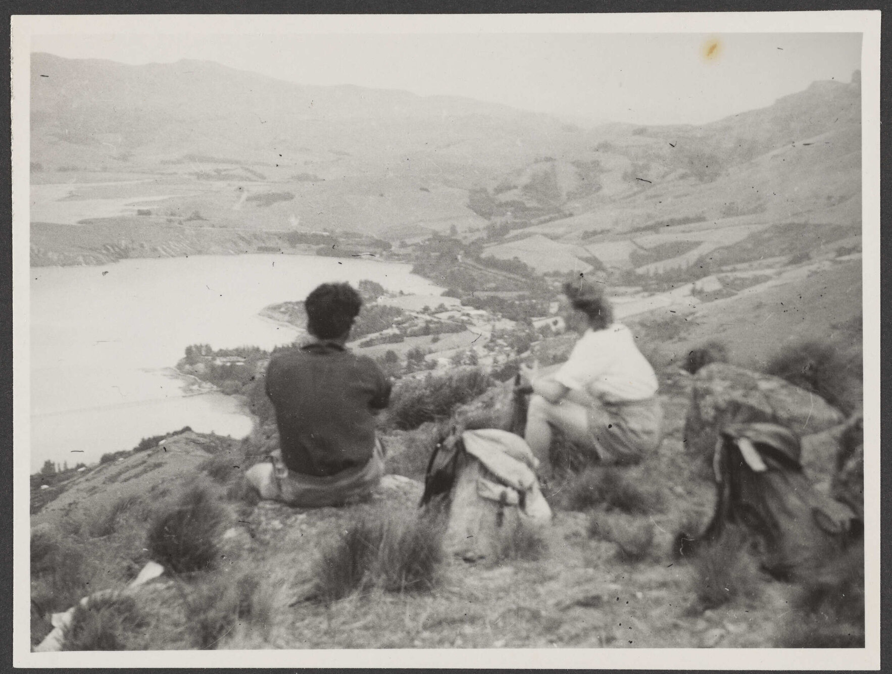 Margaret Scott and Charles Brasch on top of a hill