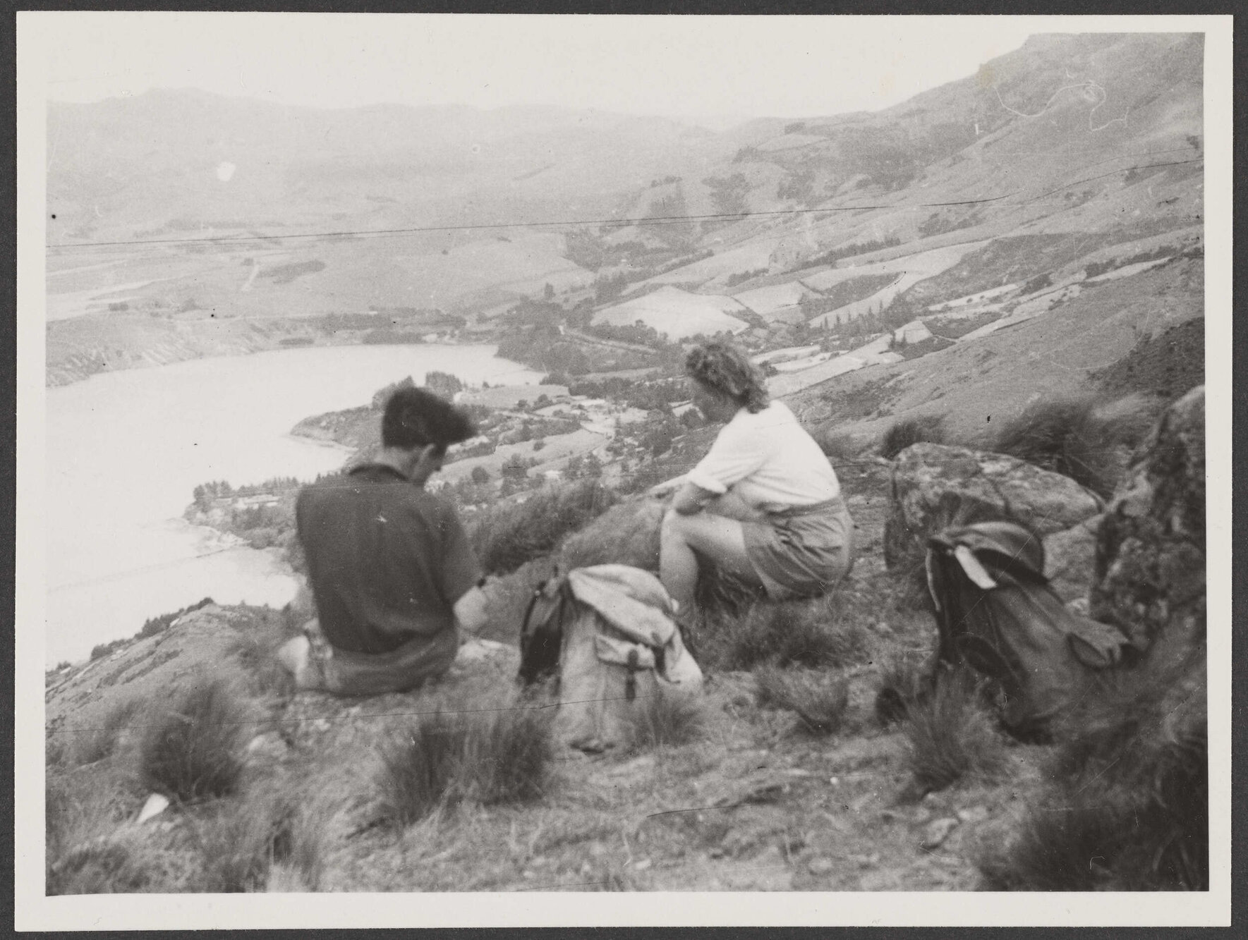 Margaret Scott and Charles Brasch on top of a hill