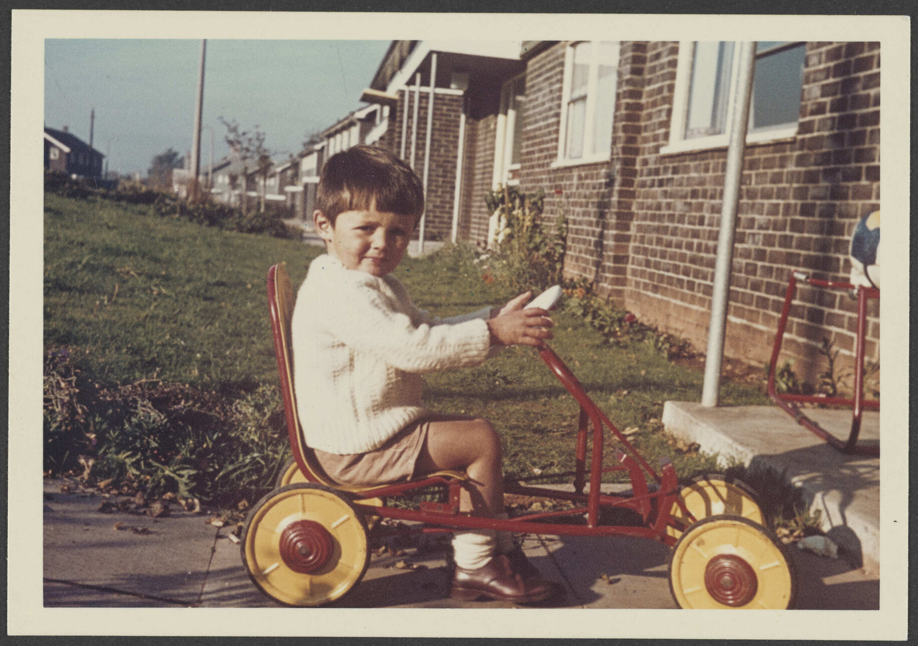 Jeremy Railton on a toy car
