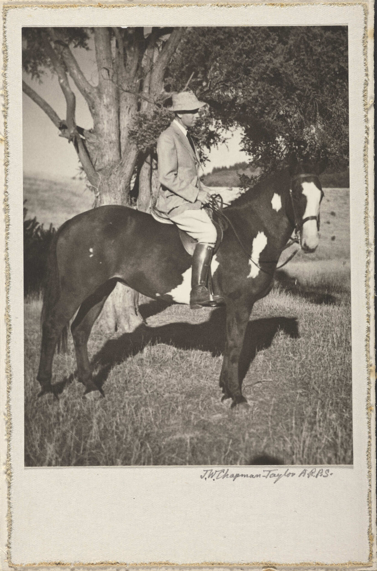Unidentified man on a horse