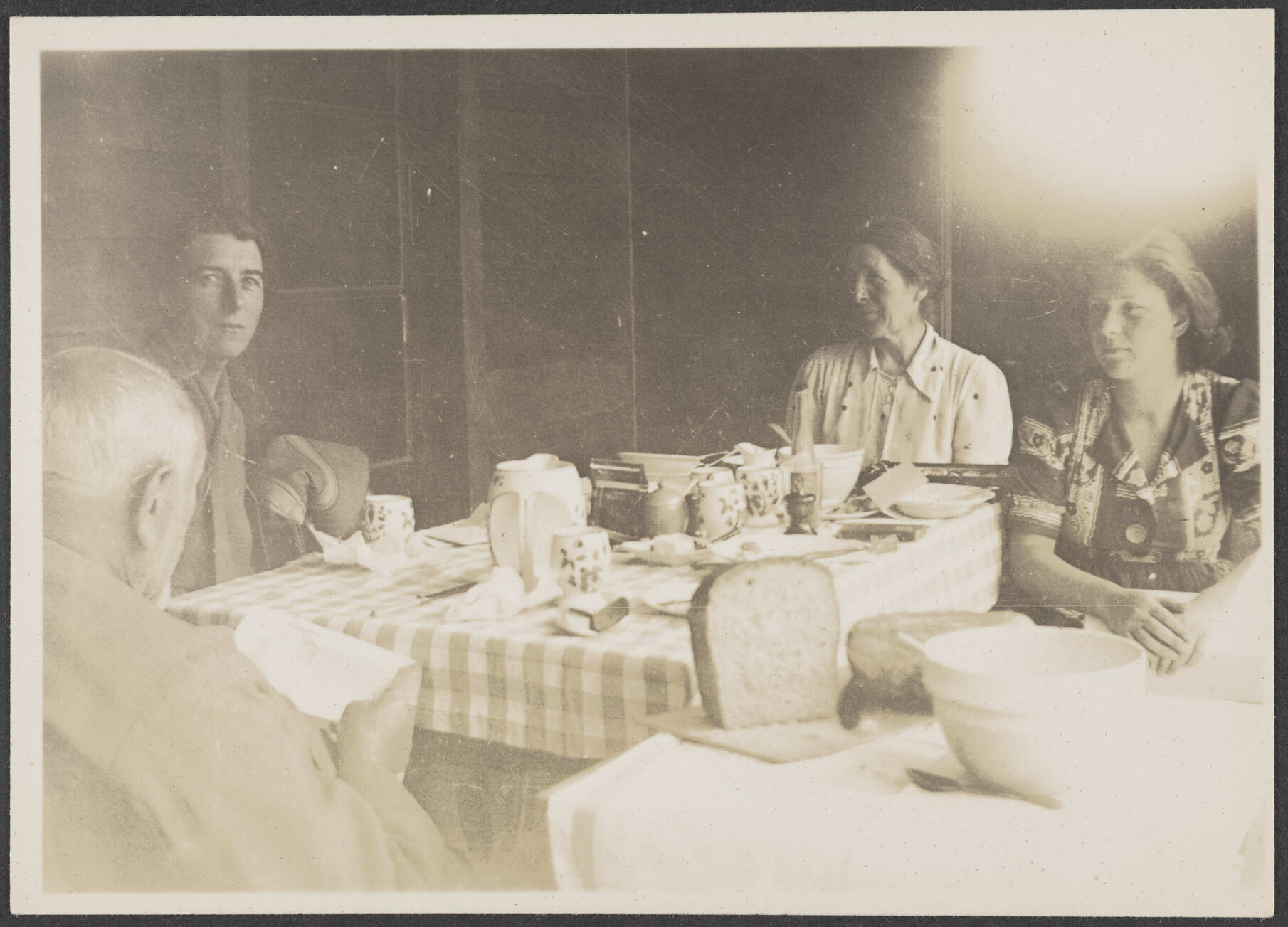 'Grandfather, Auntie Kate, Mother and I, lunch on the verandah in Queenstown at Xmas'