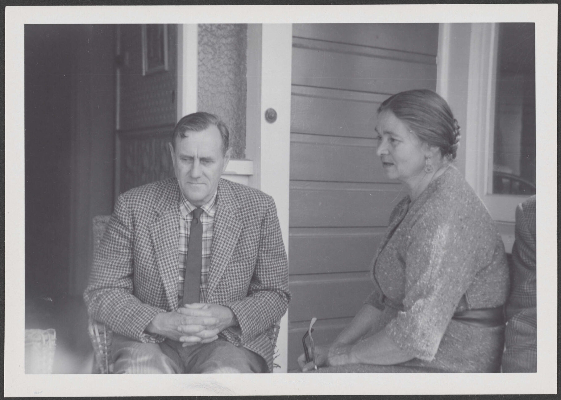 Patrick White and Peggy Garland on a porch