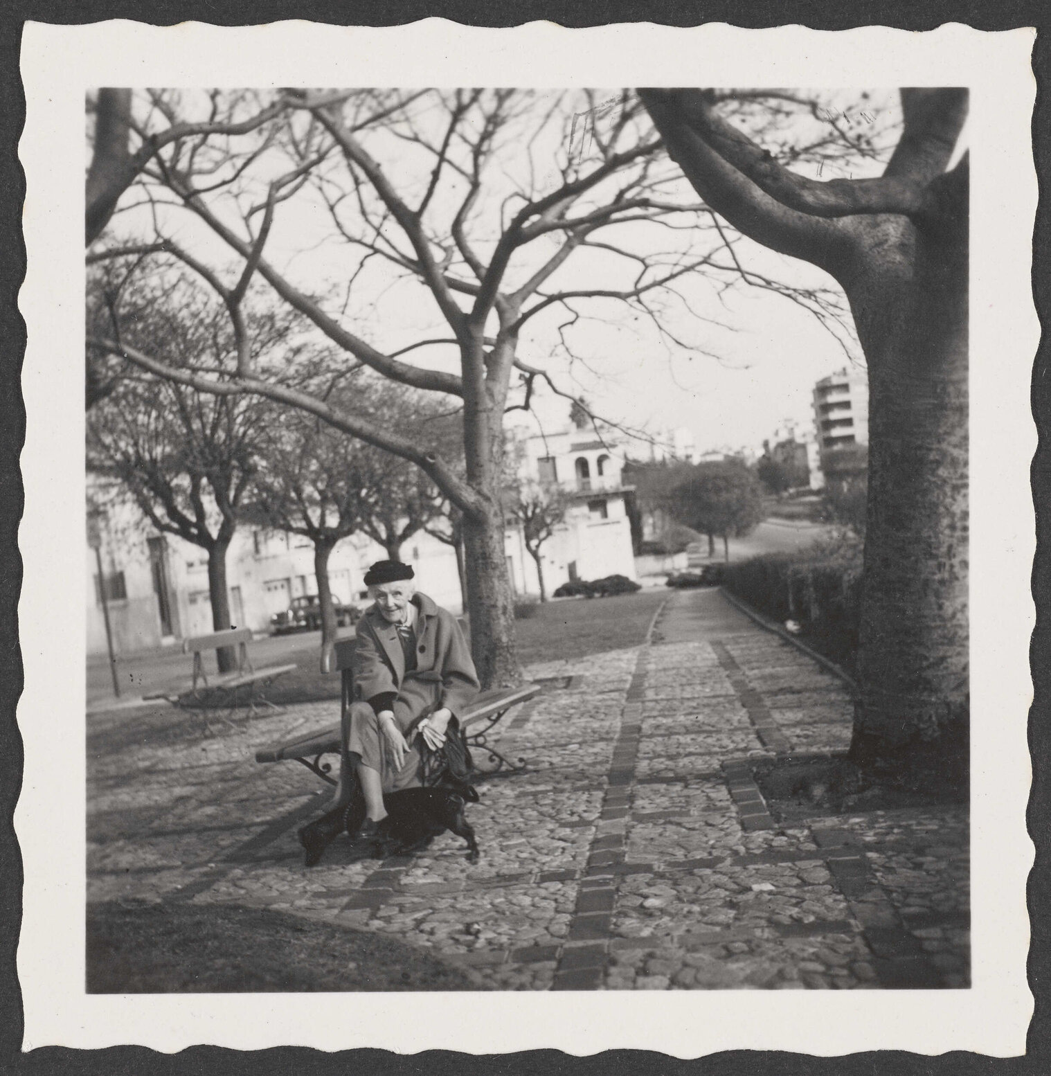 Ethel Englefield on the street with a dog