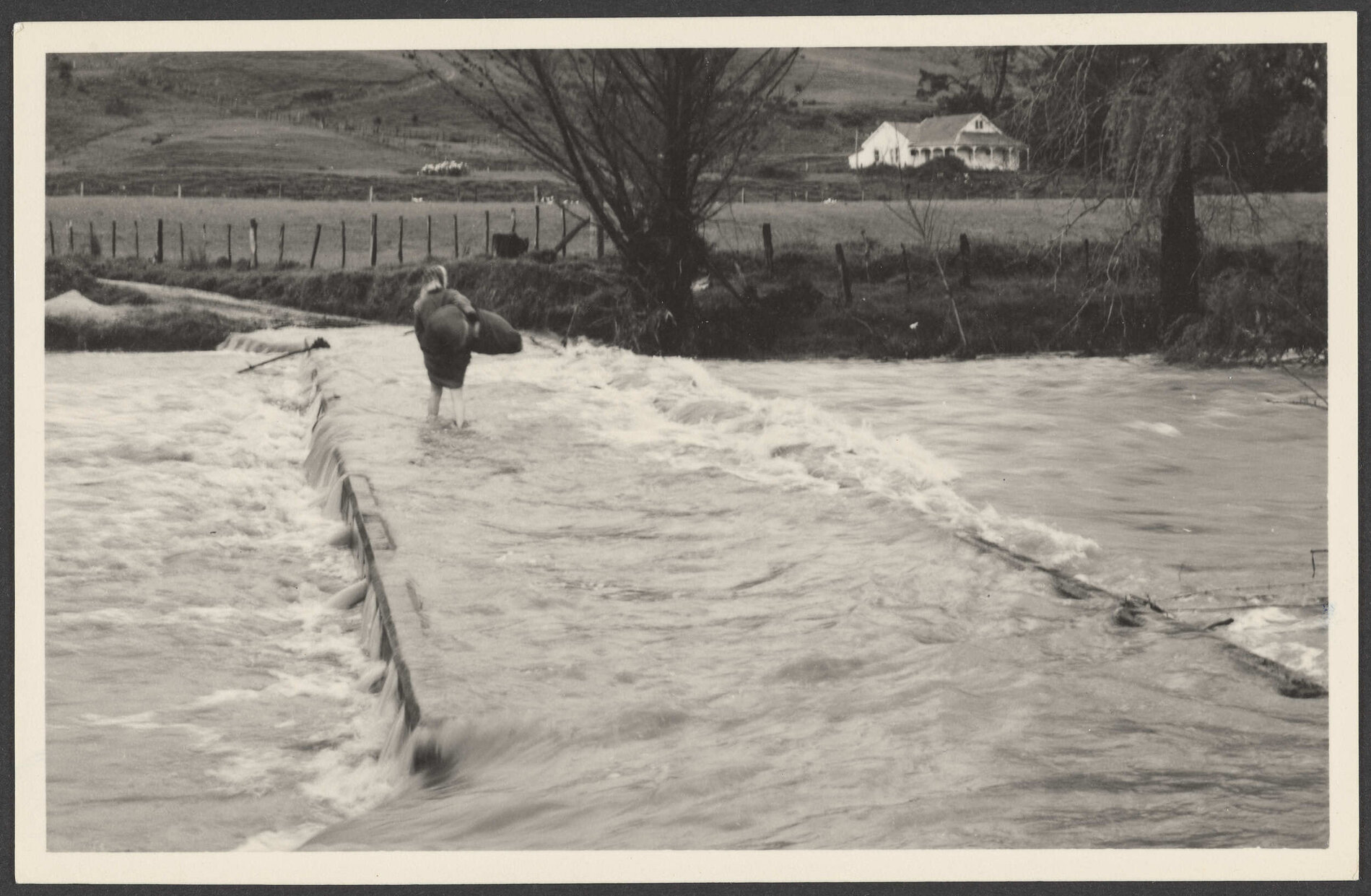 Person crossing a fast flowing river