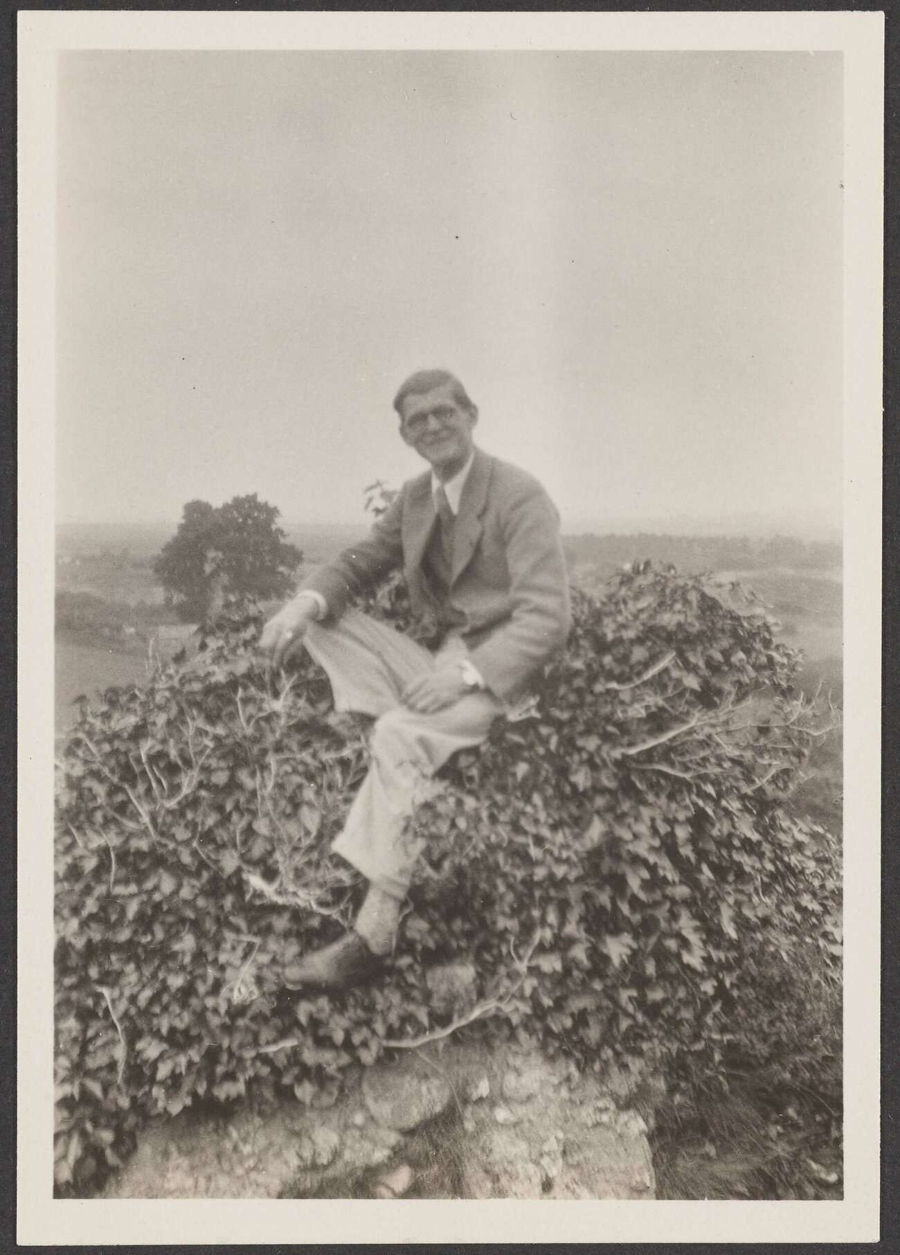 Unknown man sitting in bush
