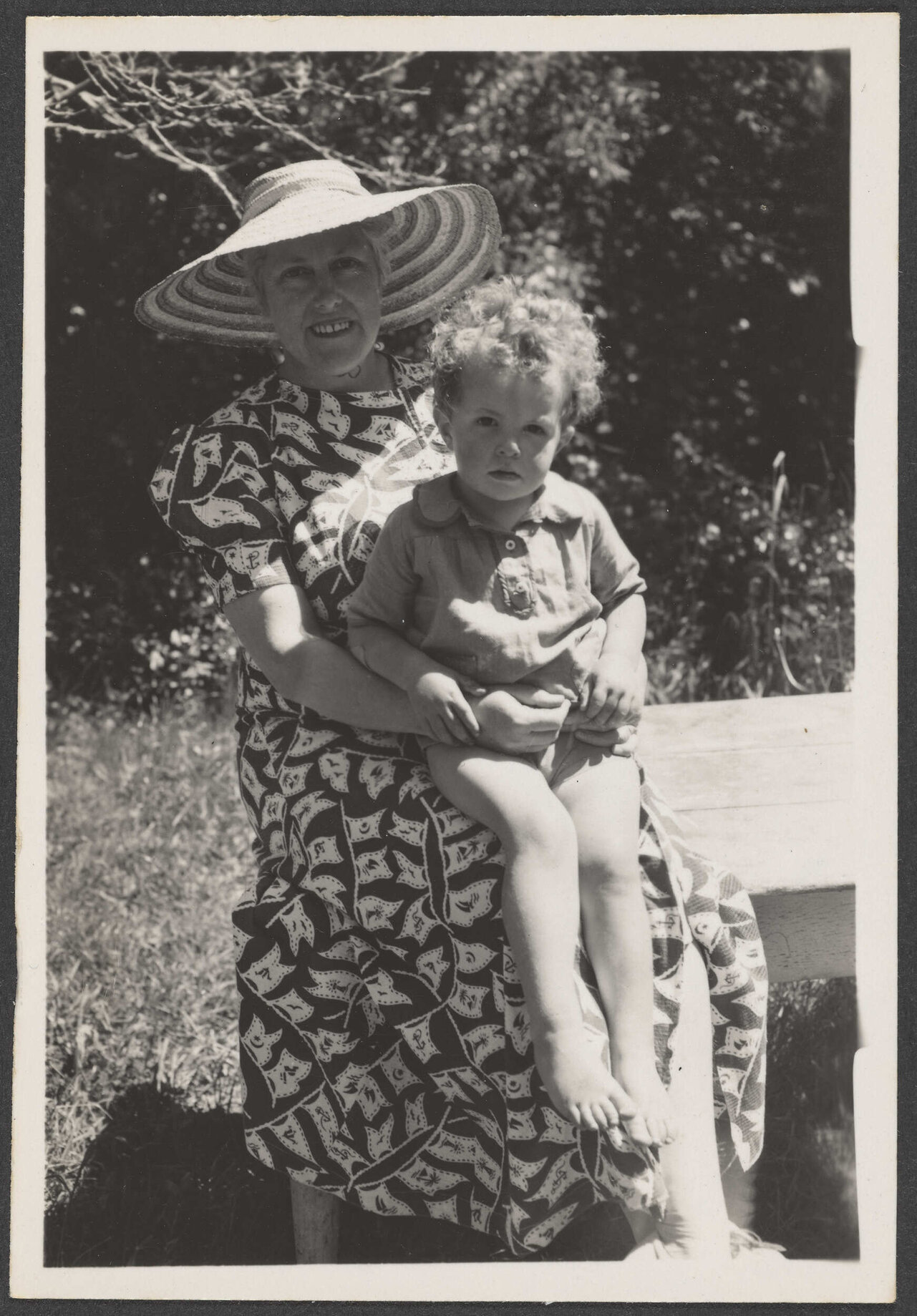 Woman with little boy on lap