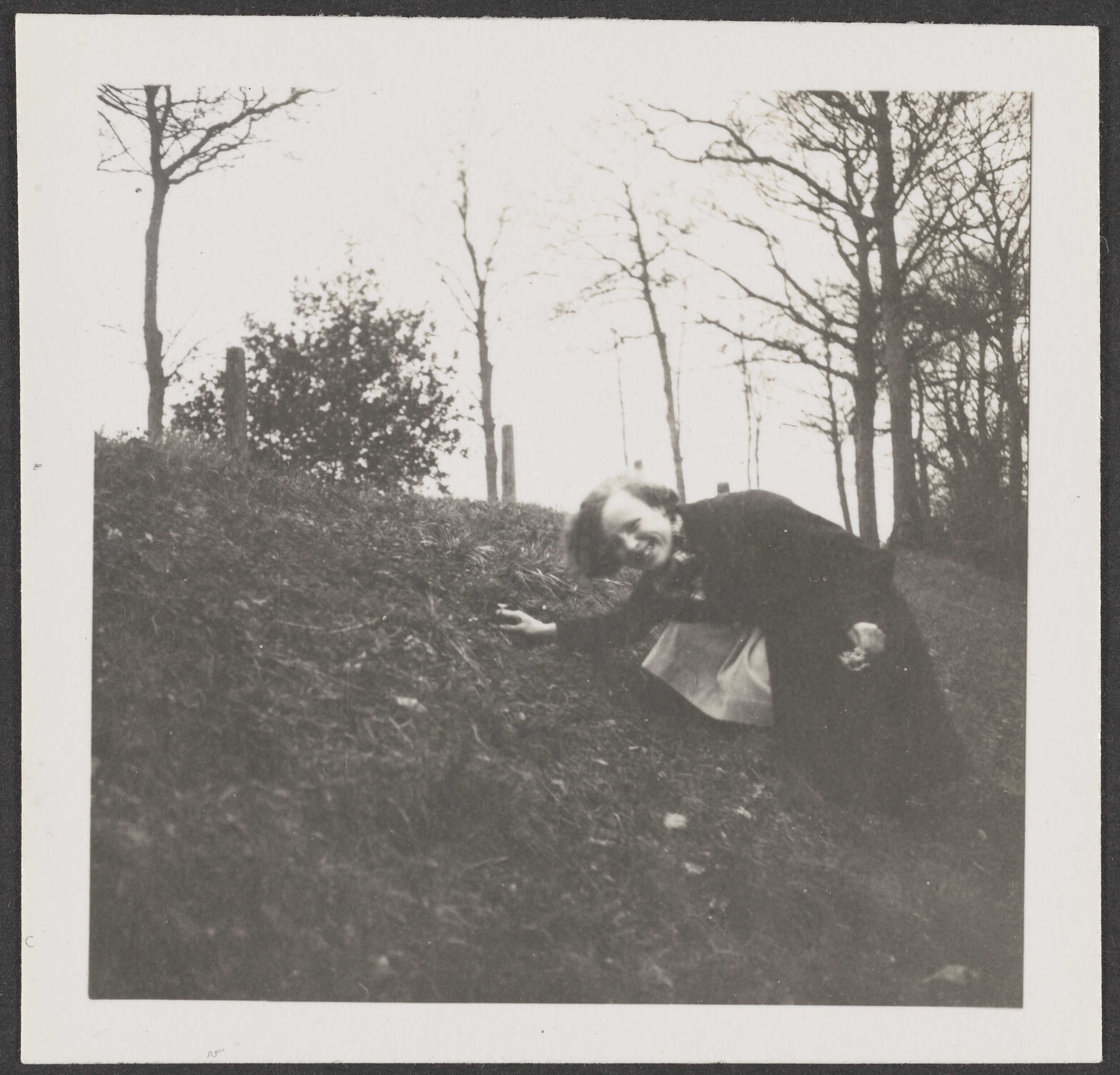 Girl on grassy bank [Edna]