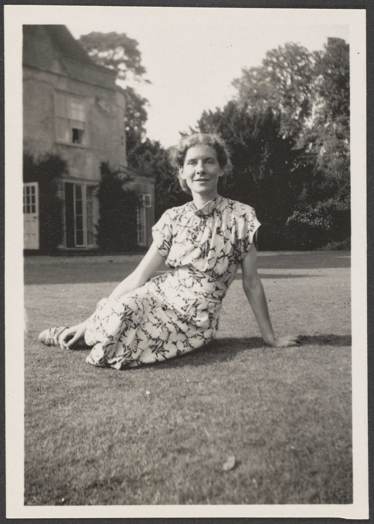 Woman sitting on grass