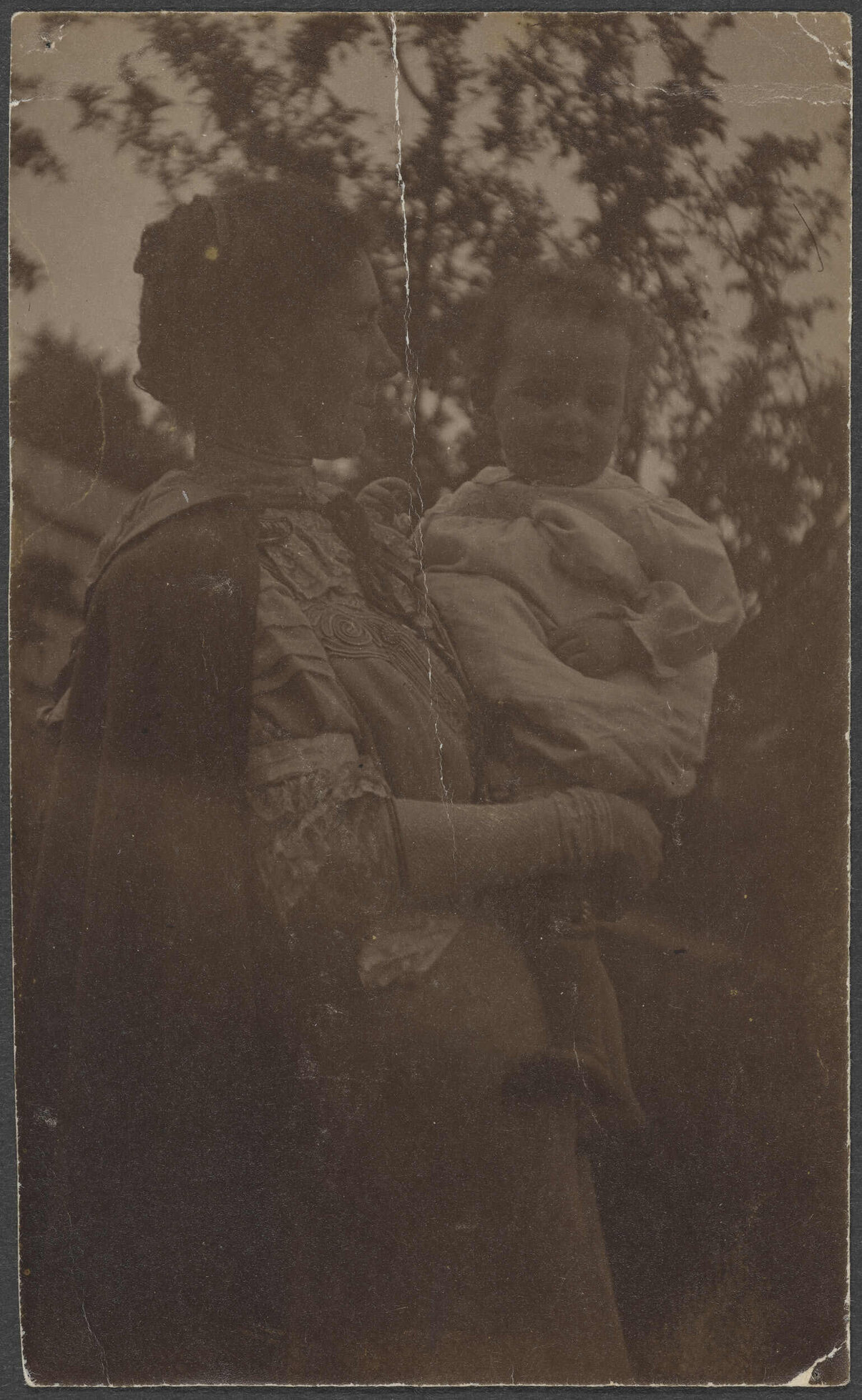 Unidentified woman and child