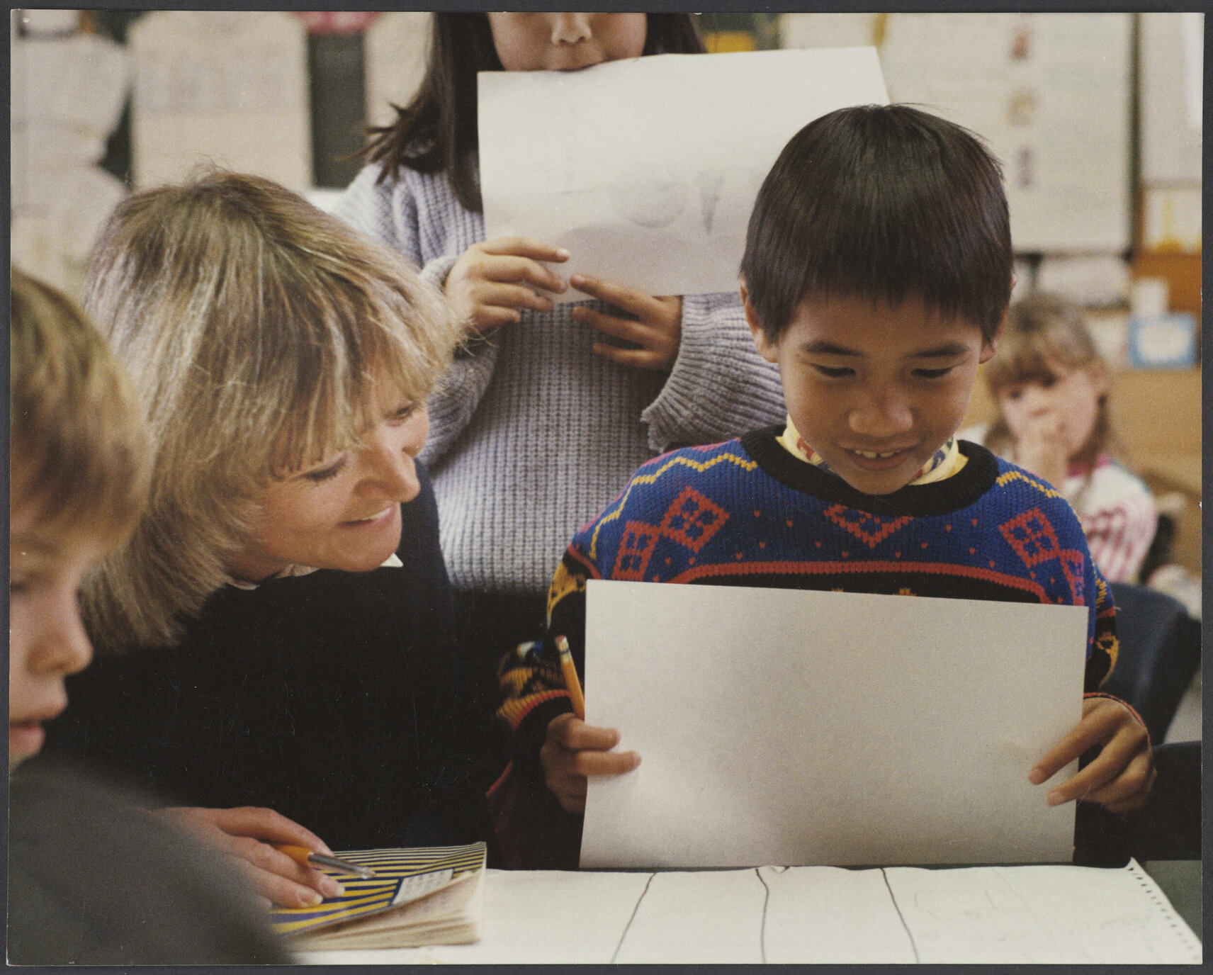 Teacher and pupils in classroom