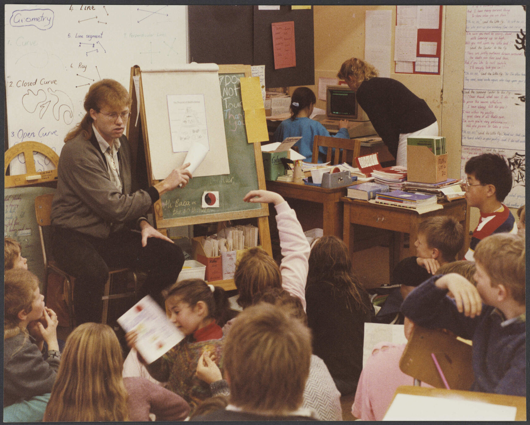 Teacher and pupils in classroom