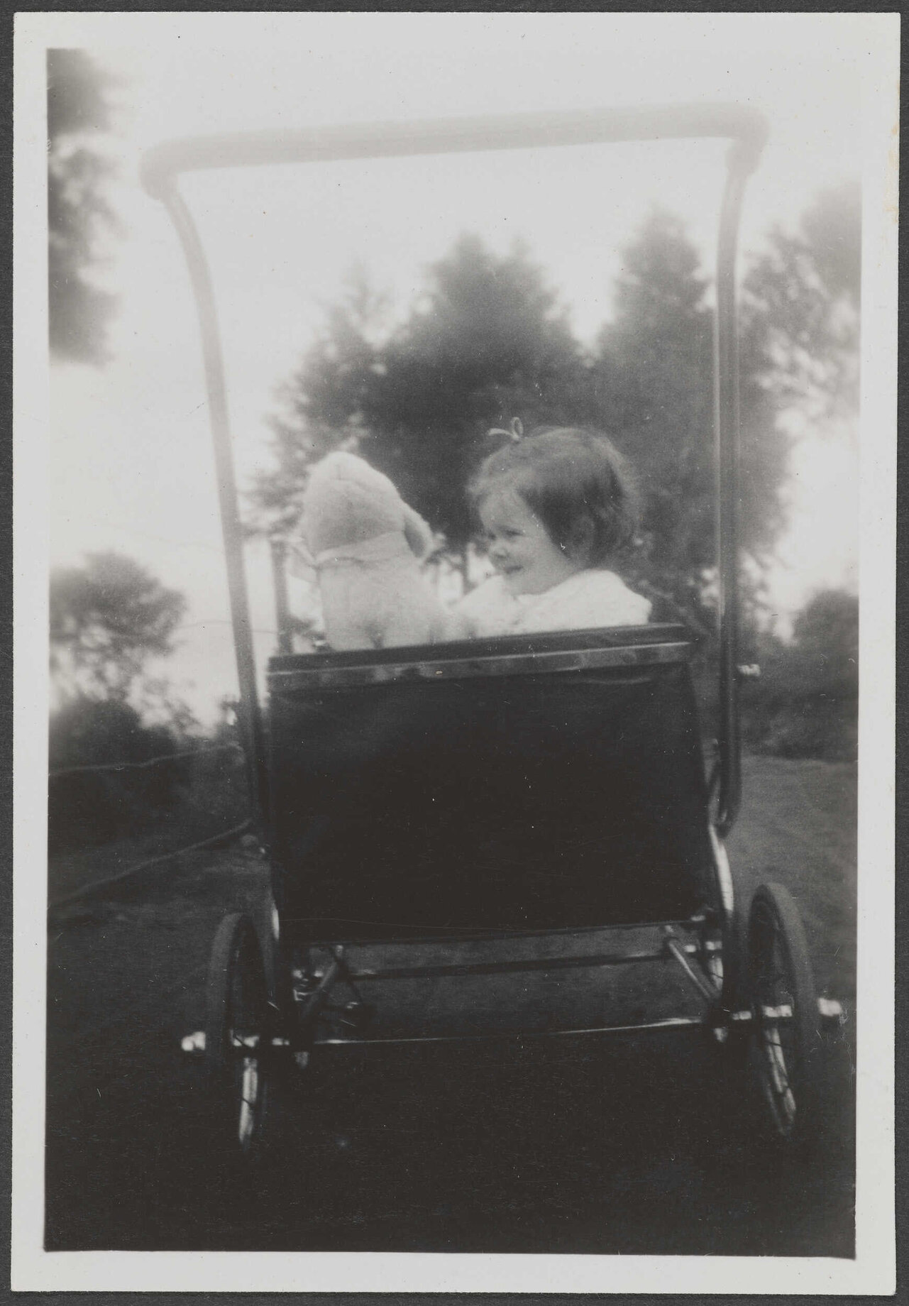 Unidentified girl in pram