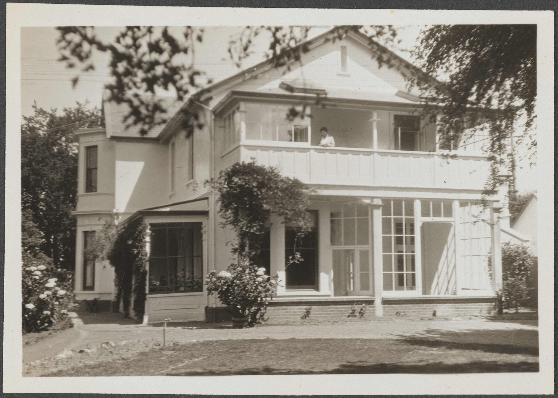 Bankton with unidentified person on balcony