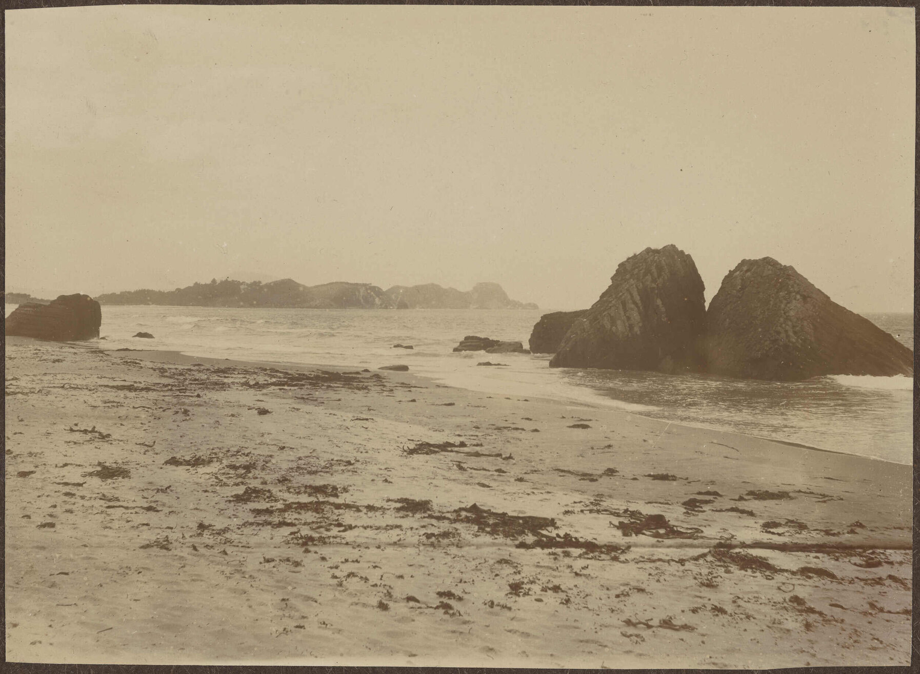 Karitane beach featuring two large boulders
