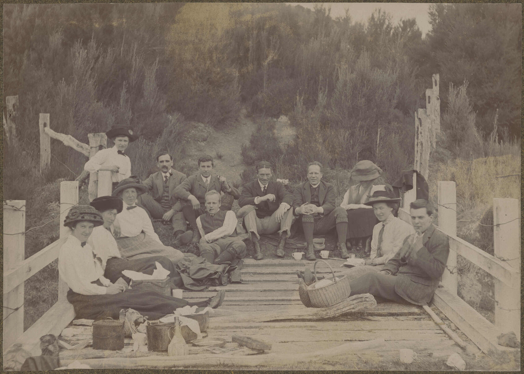 Family picnic, sitting on a pier