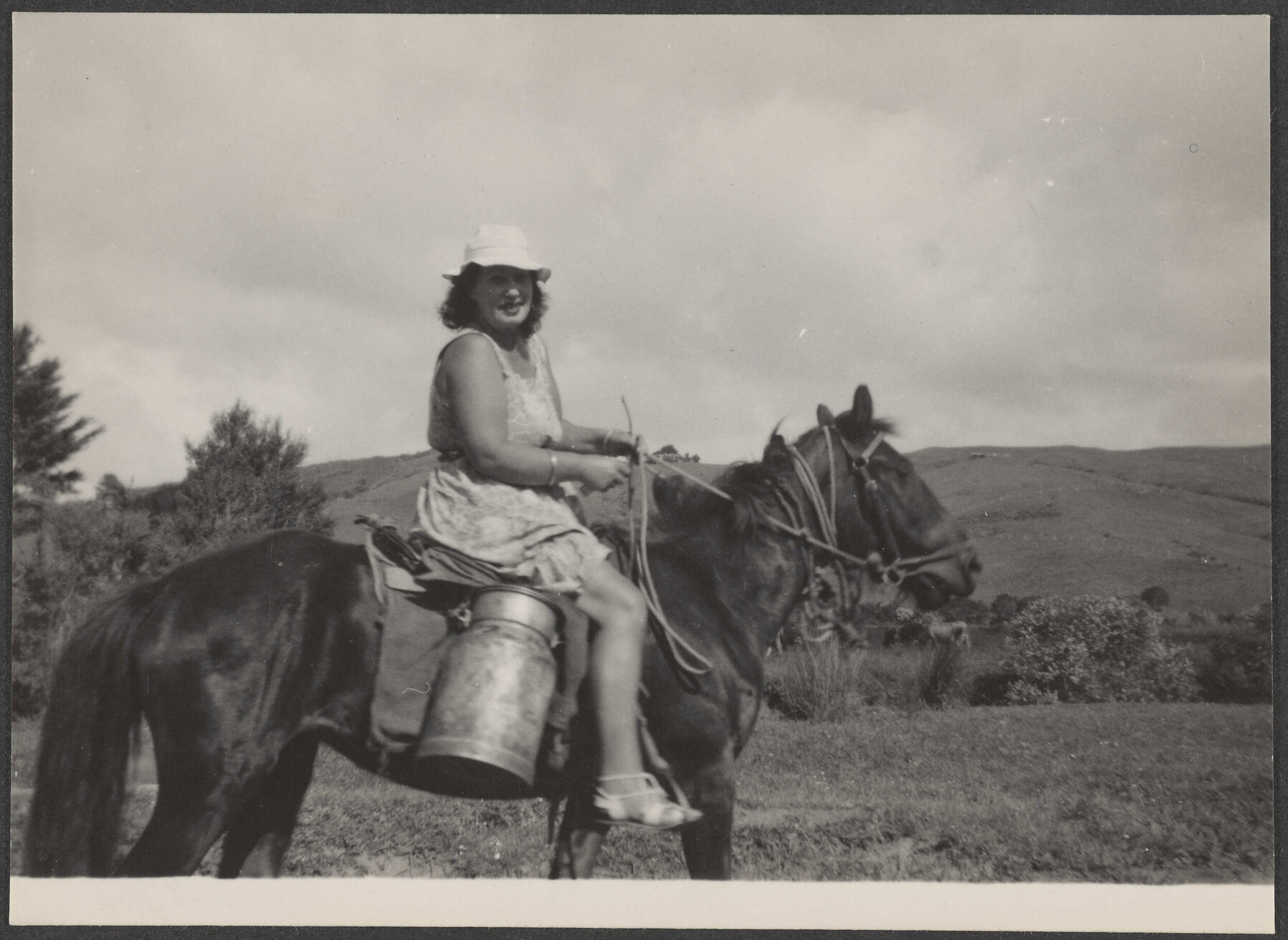 Woman riding a horse