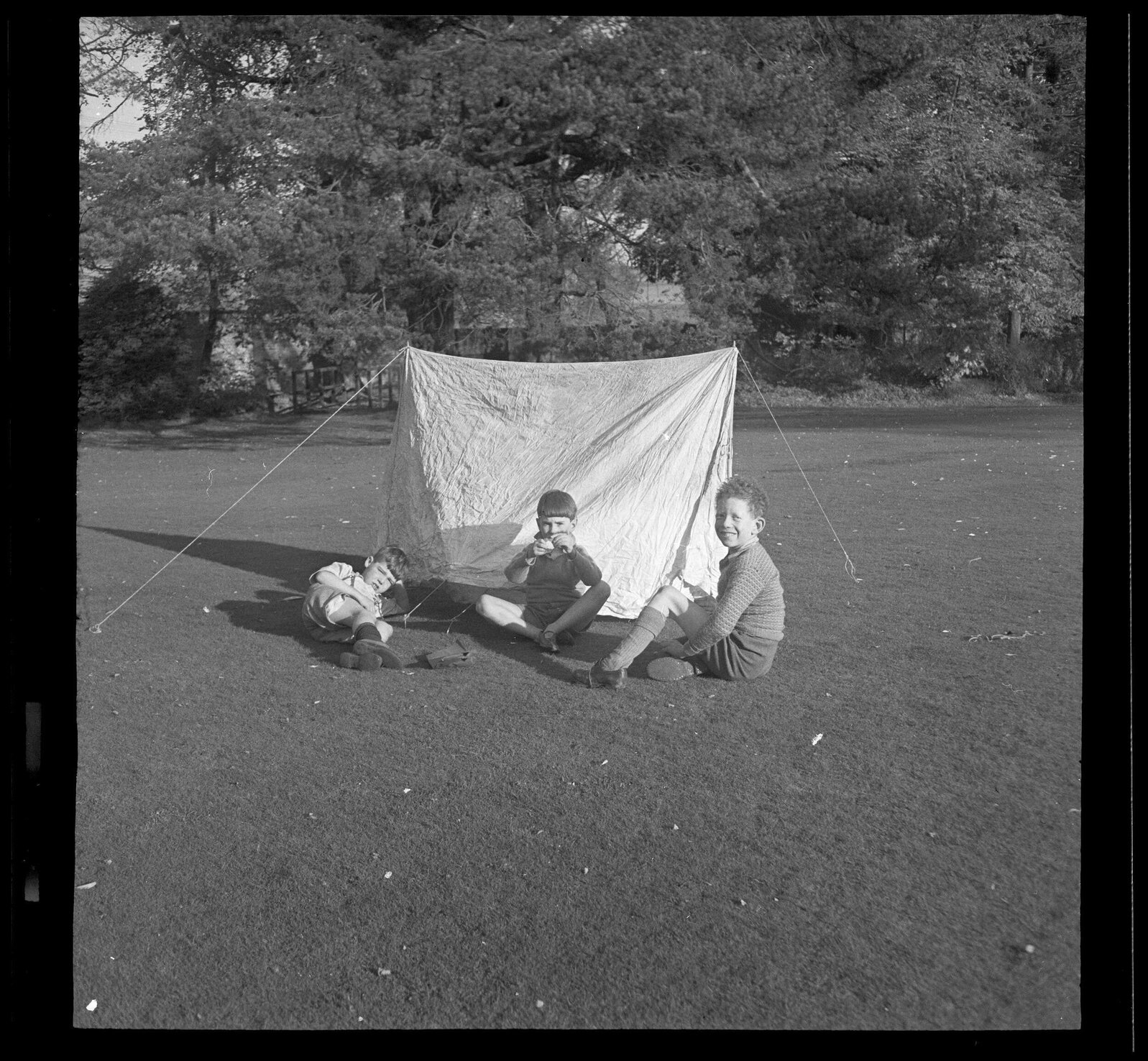 'Michael, Vernon, Robert Petherwick' with tent