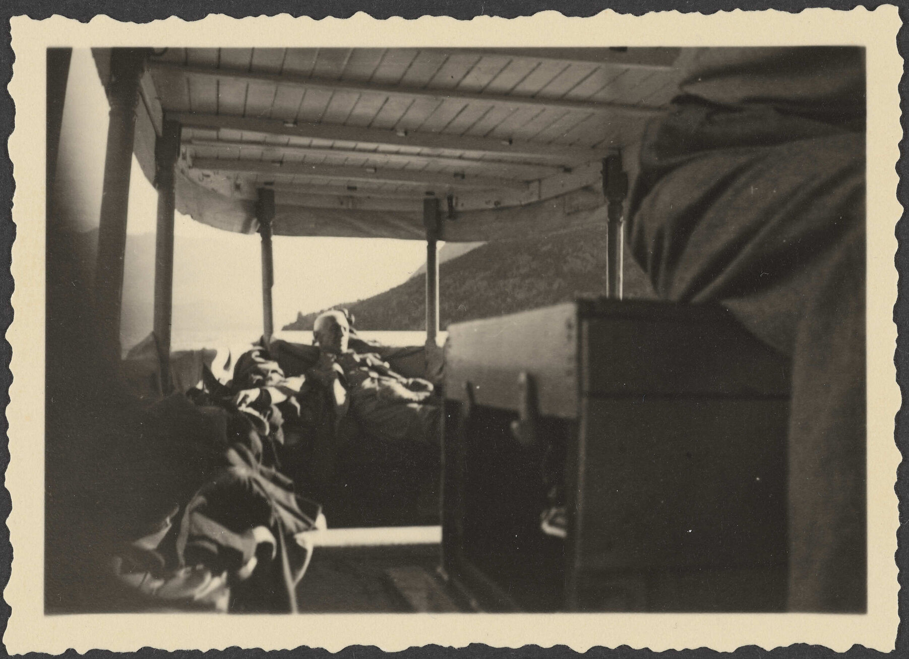 Man reclining on a boat