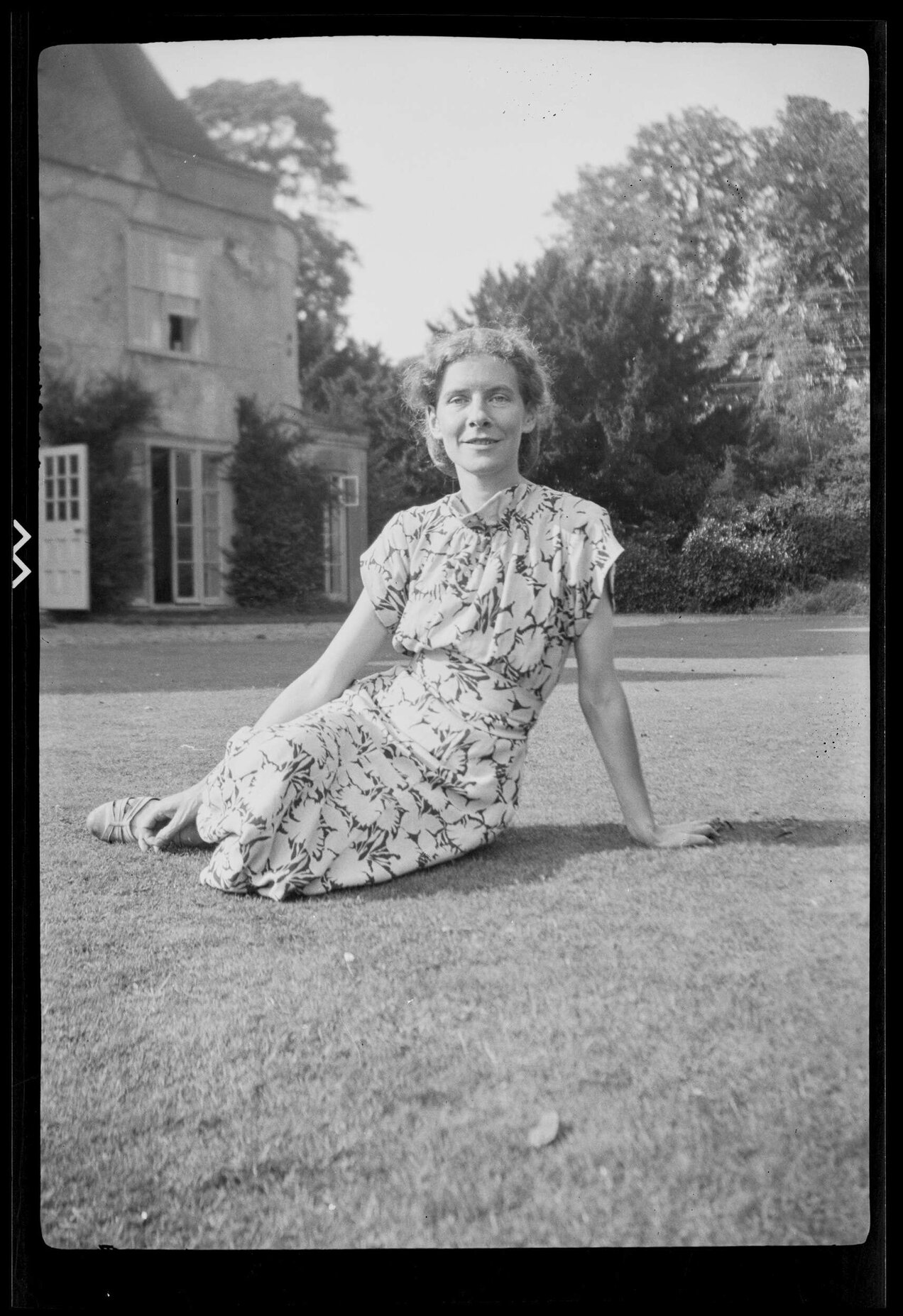Woman sitting on grass