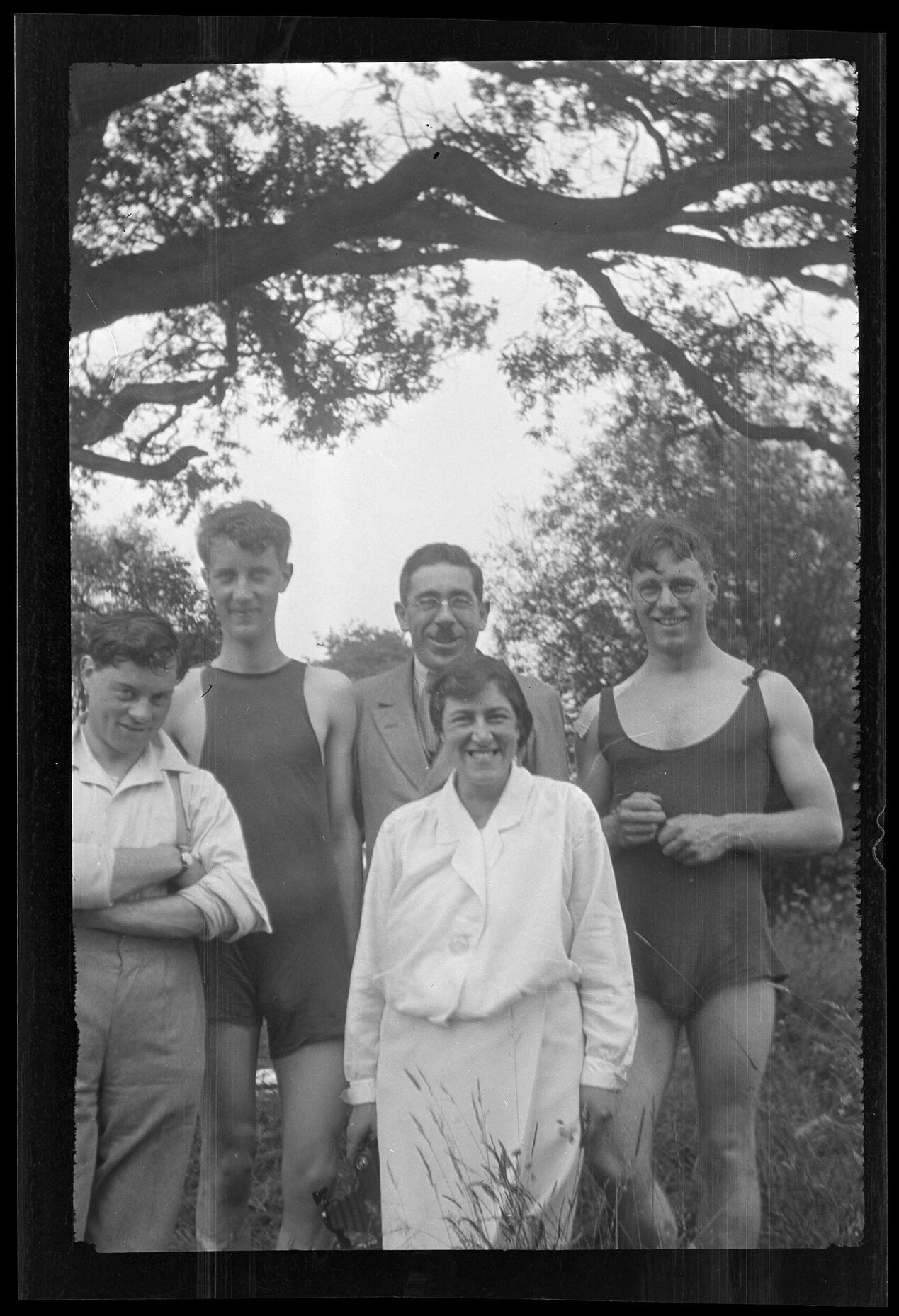 Five people outdoors, including Esmond de Beer