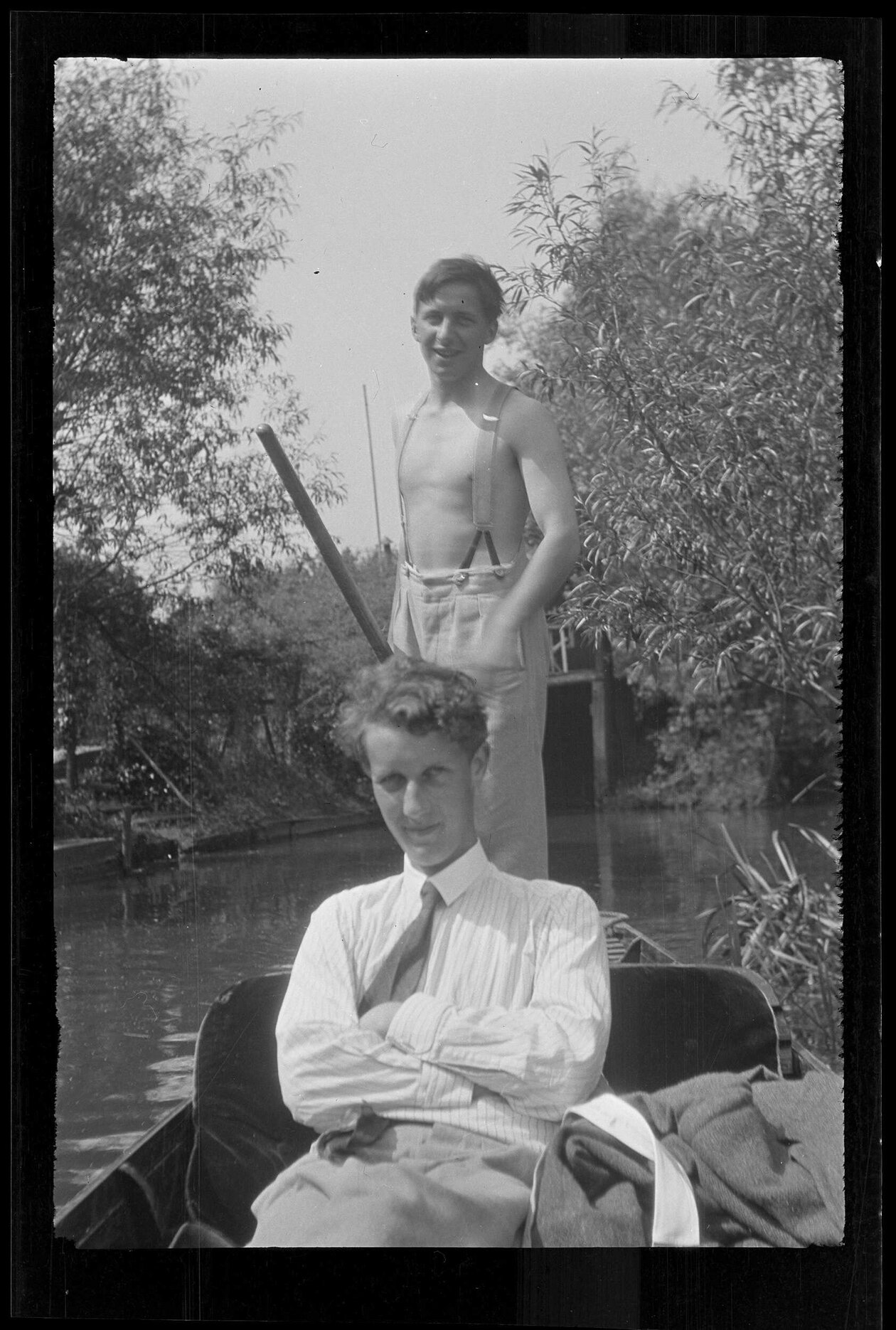 Reggie Howlett and Colin Roberts in a boat