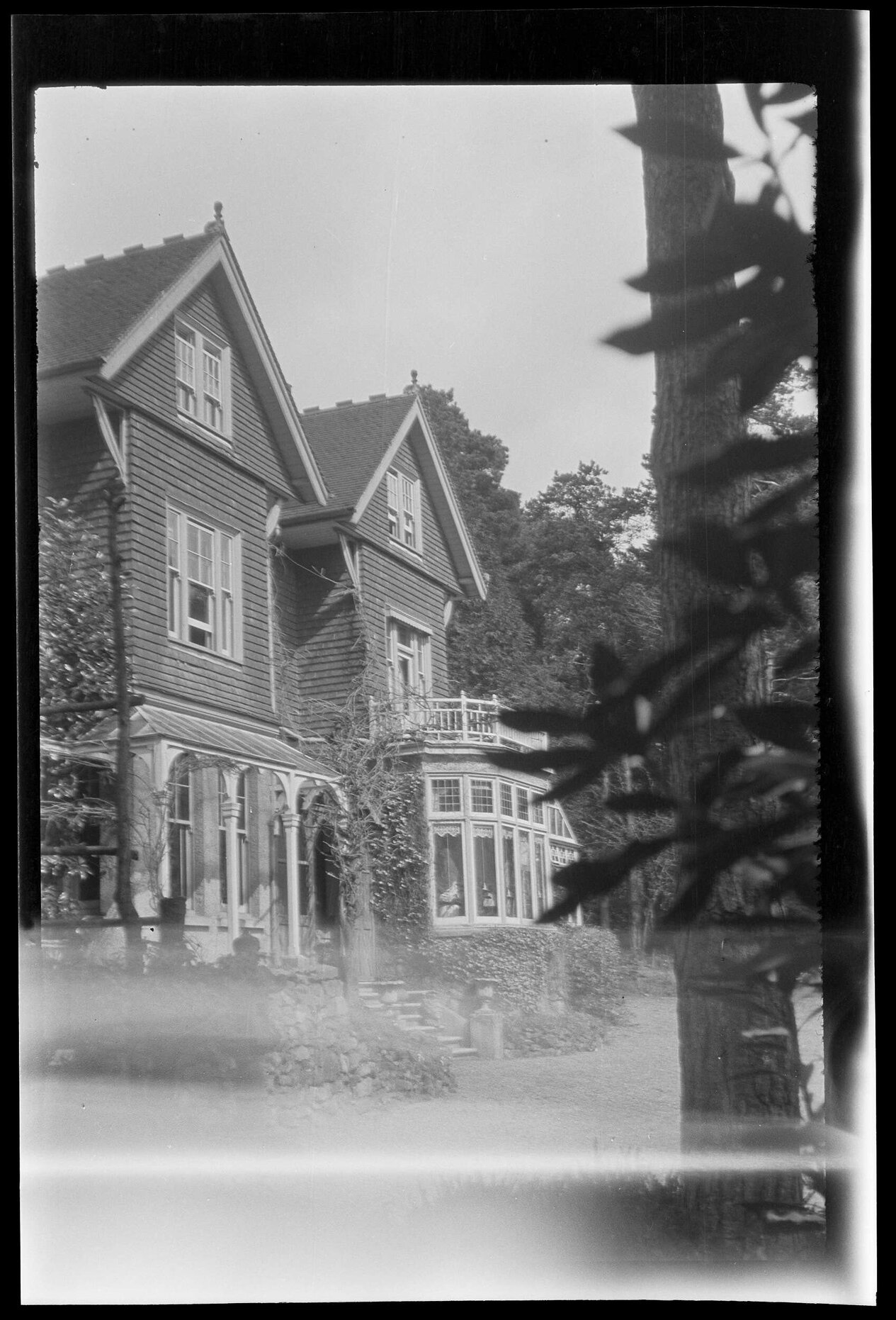 Unidentified two-storey shingled house