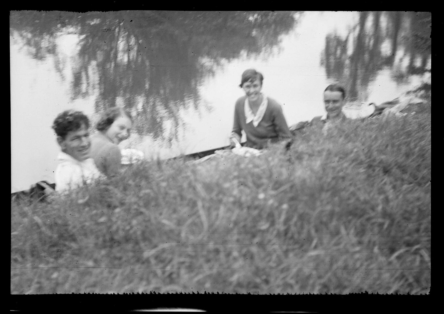James Bertram and three others in a boat