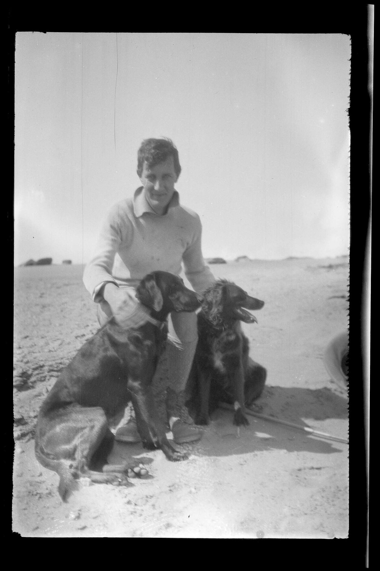 Colin Roberts with two dogs at Kom Aushim