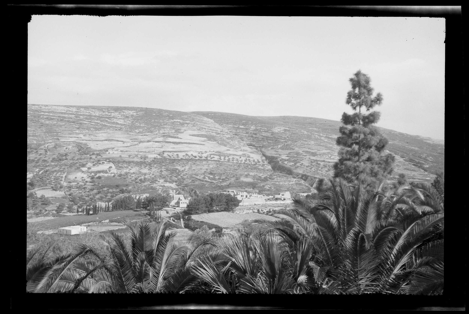 View over countryside and ruined buildings