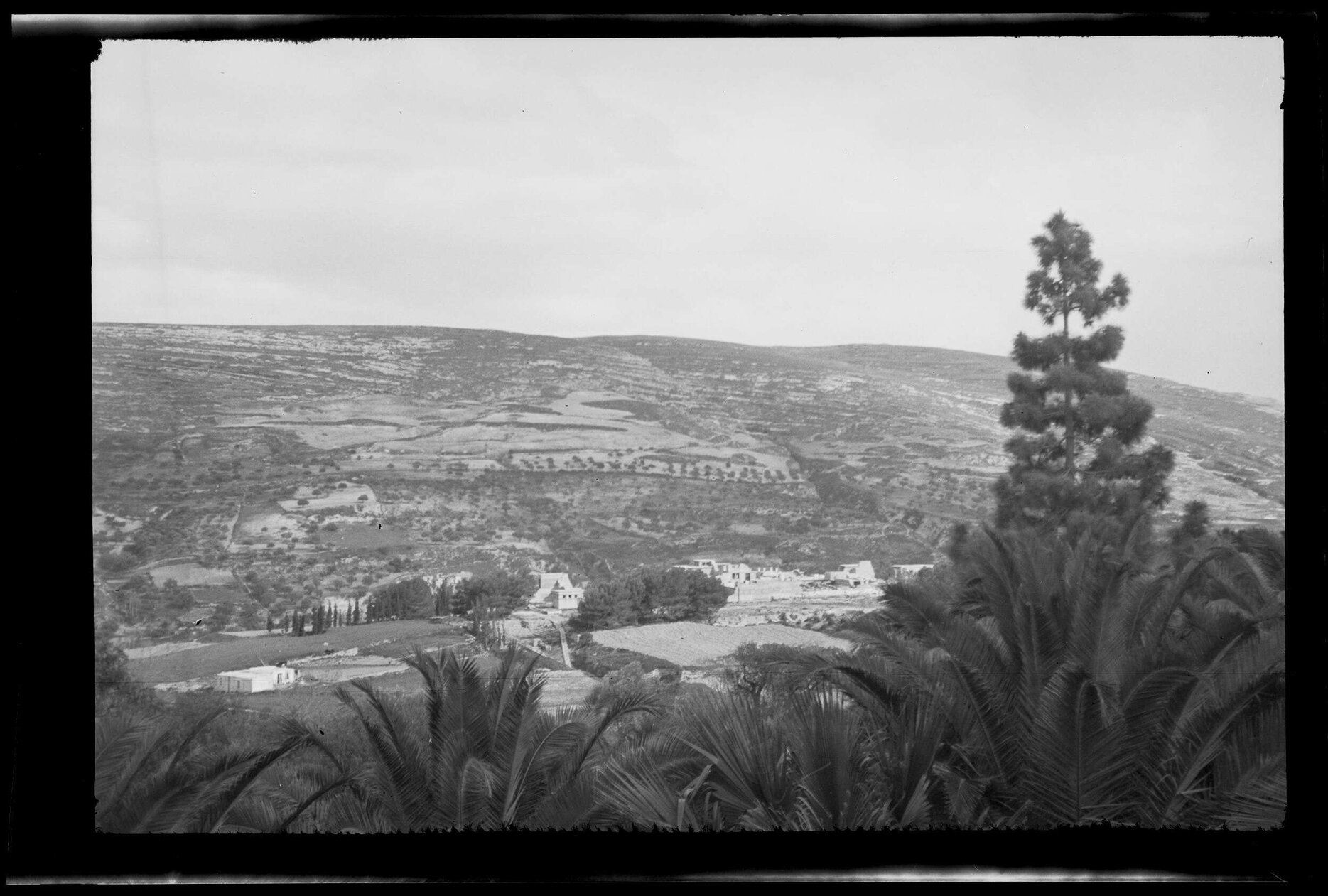View over countryside and ruined buildings